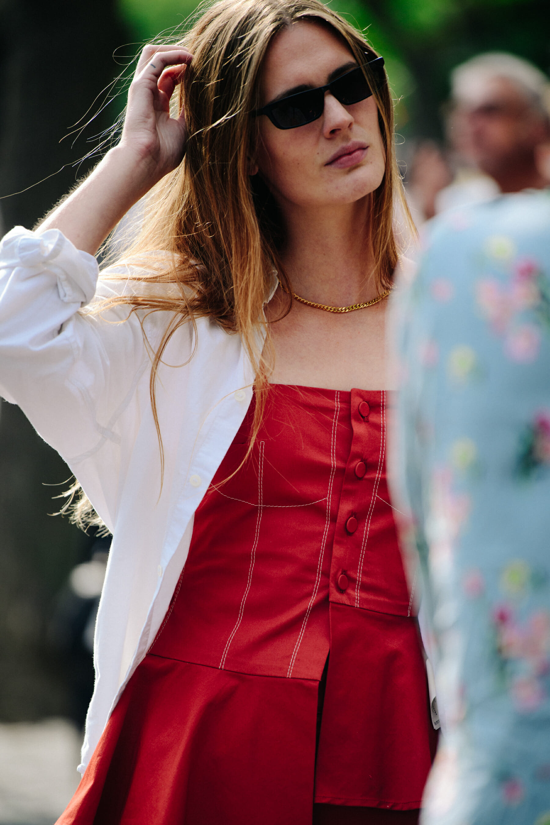 Woman wearing red top