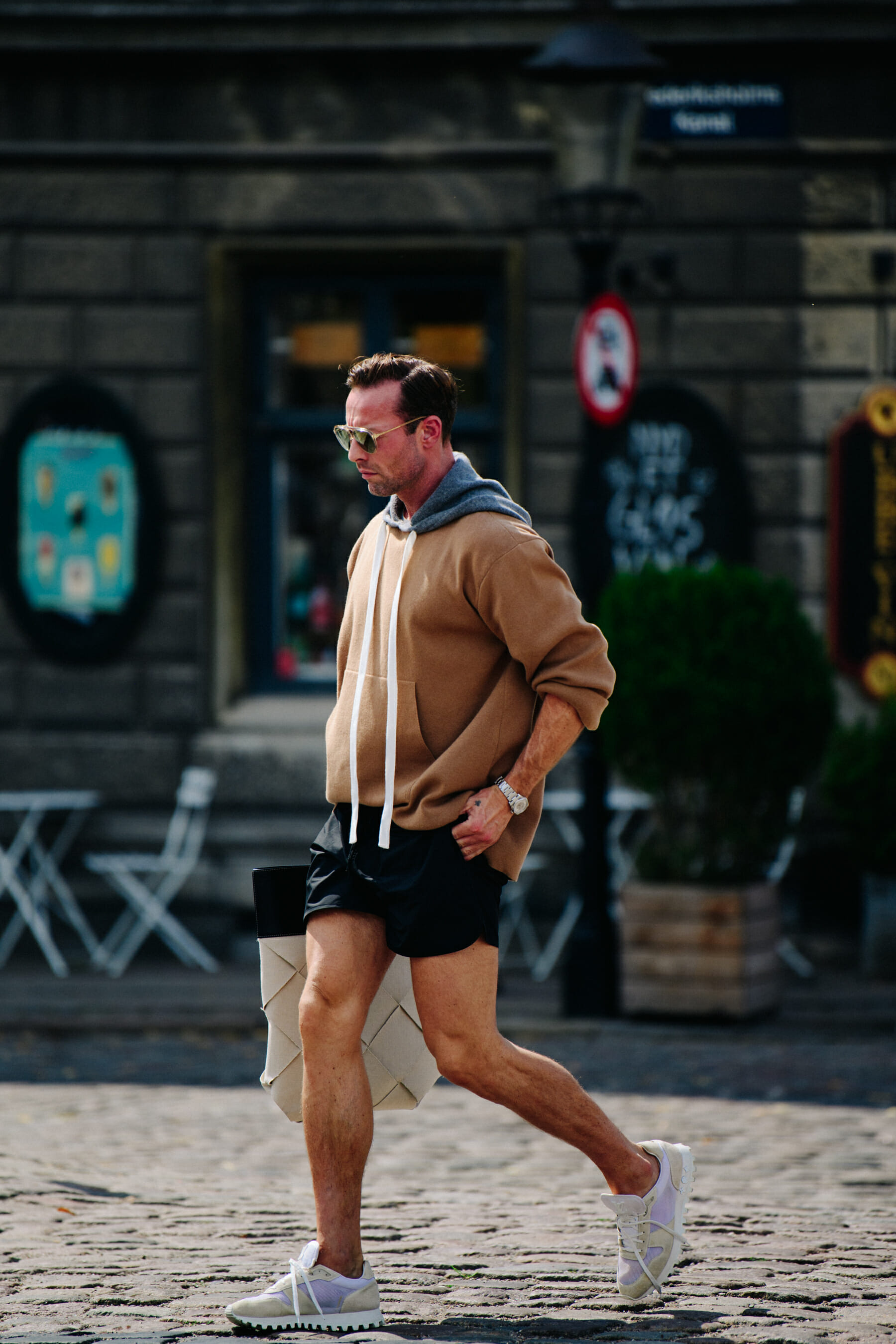 Man wearing brown hoodie