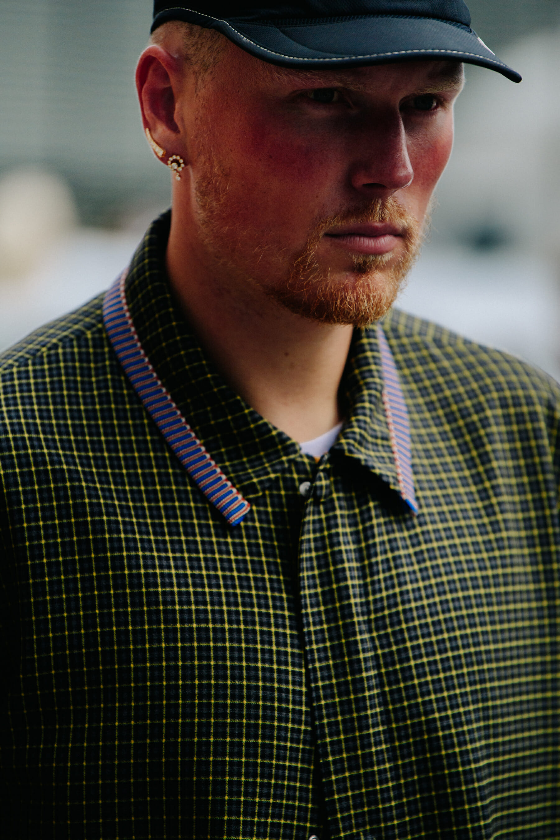 Man wearing check coat