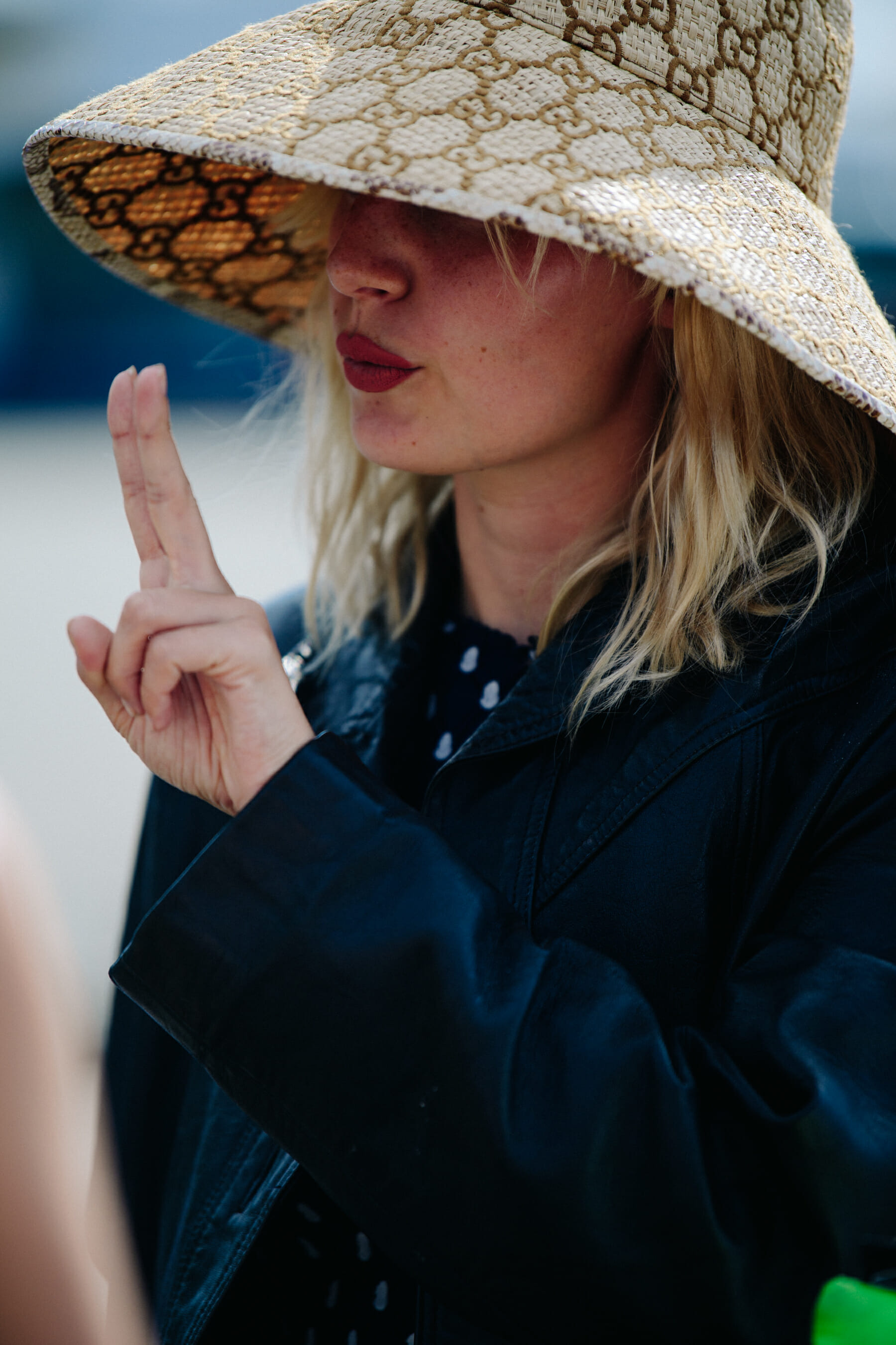 Woman wearing Gucci hat