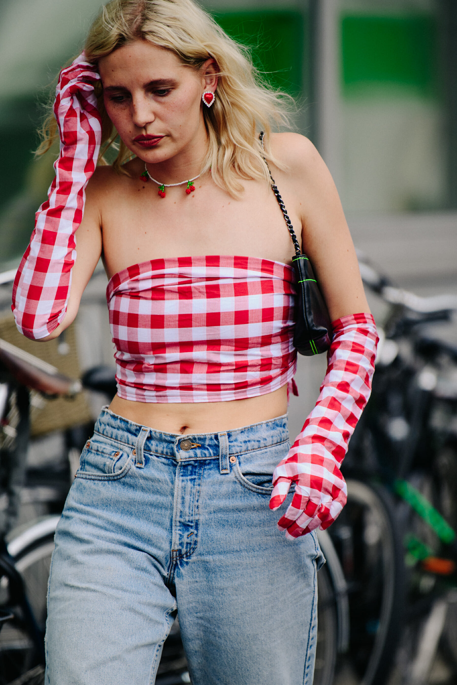 Woman wearing check gloves