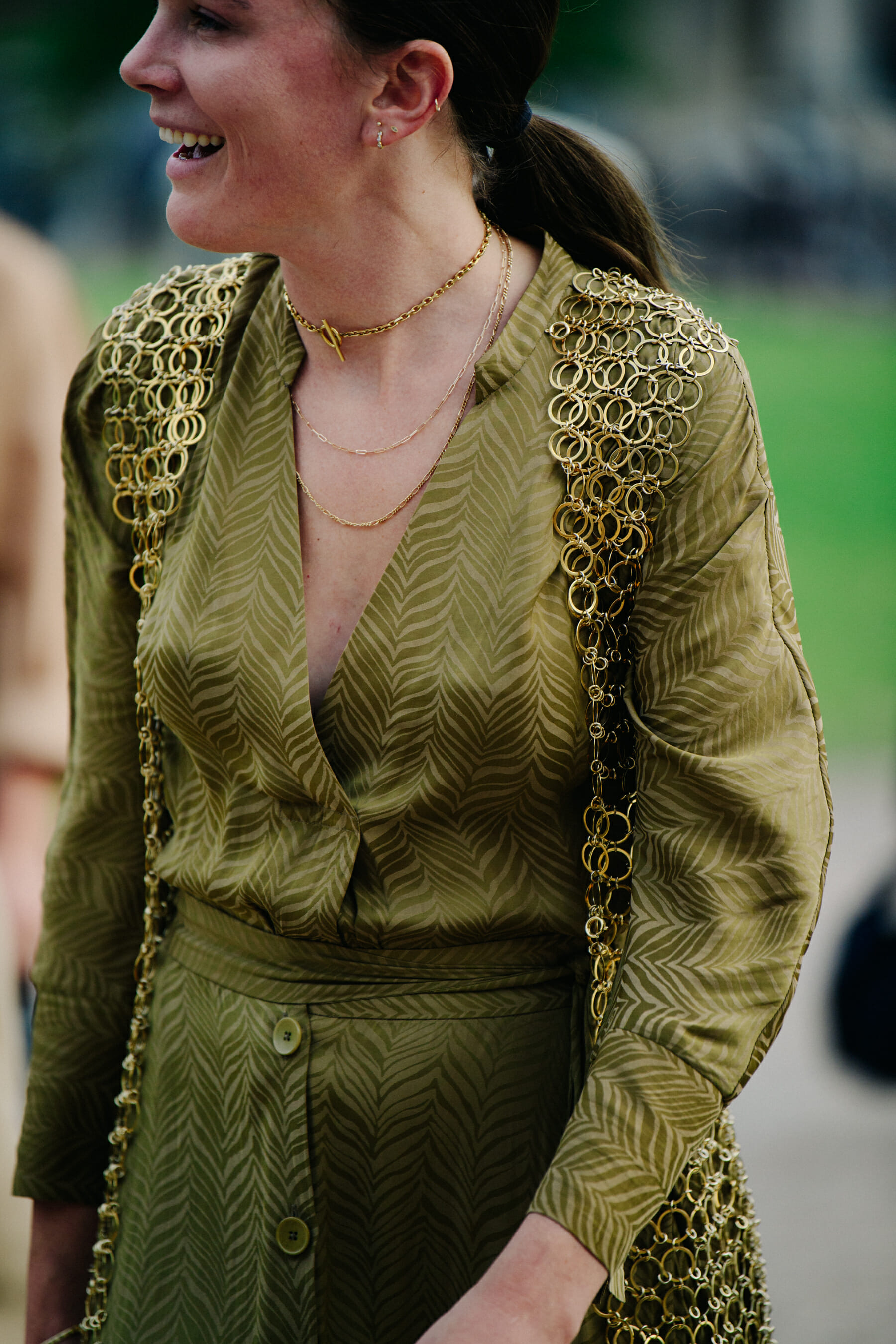 Woman wearing gold jewelery