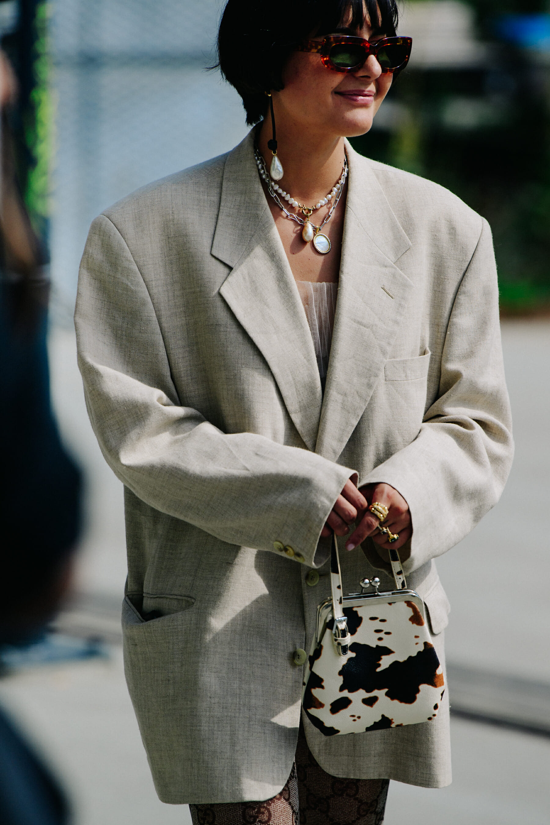 Blogger wearing pale suit