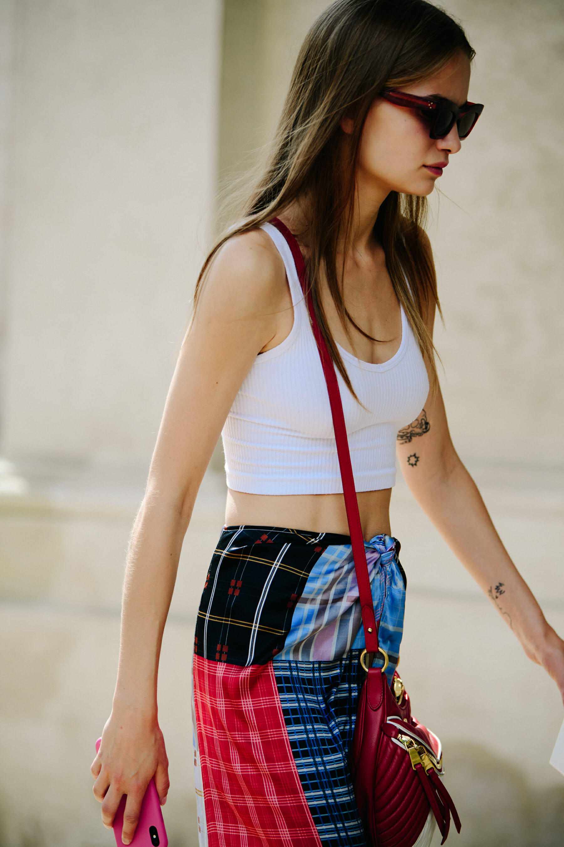 Model wearing white vest