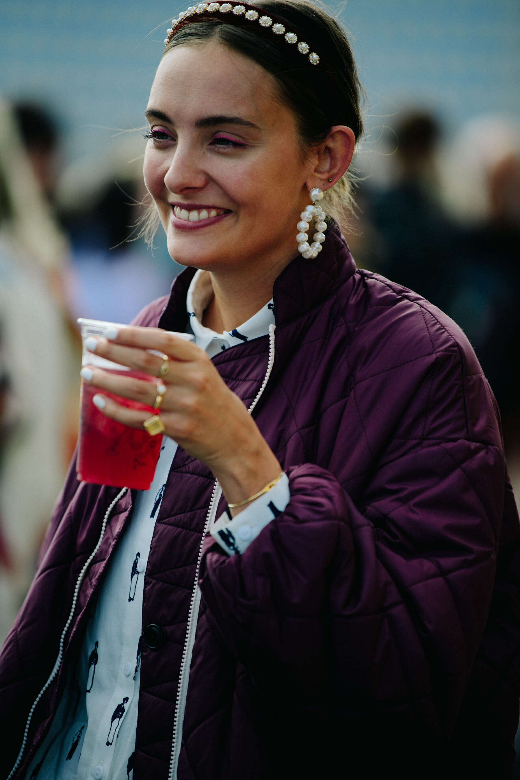 Woman wearing purple coat