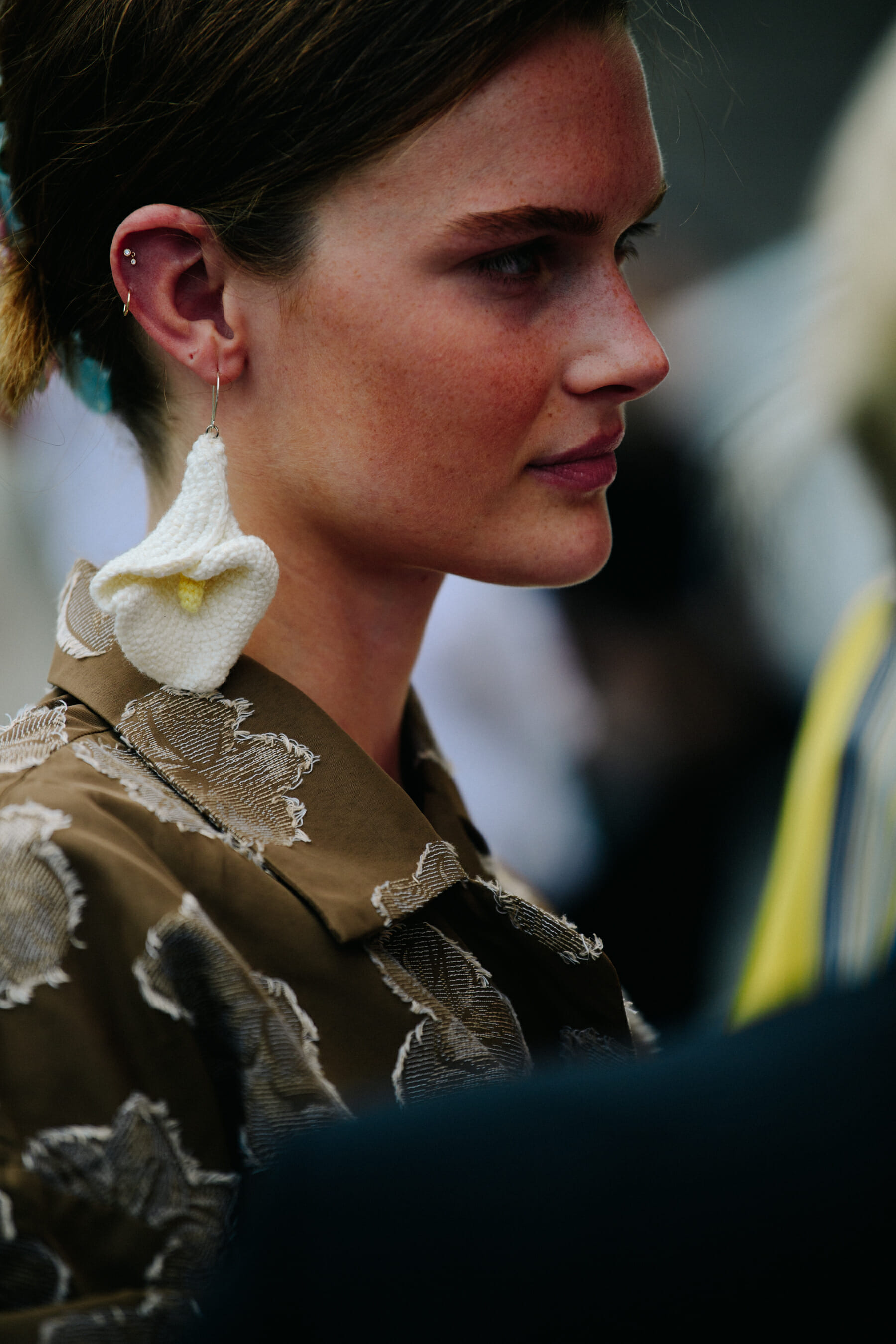Woman wearing brown jacket