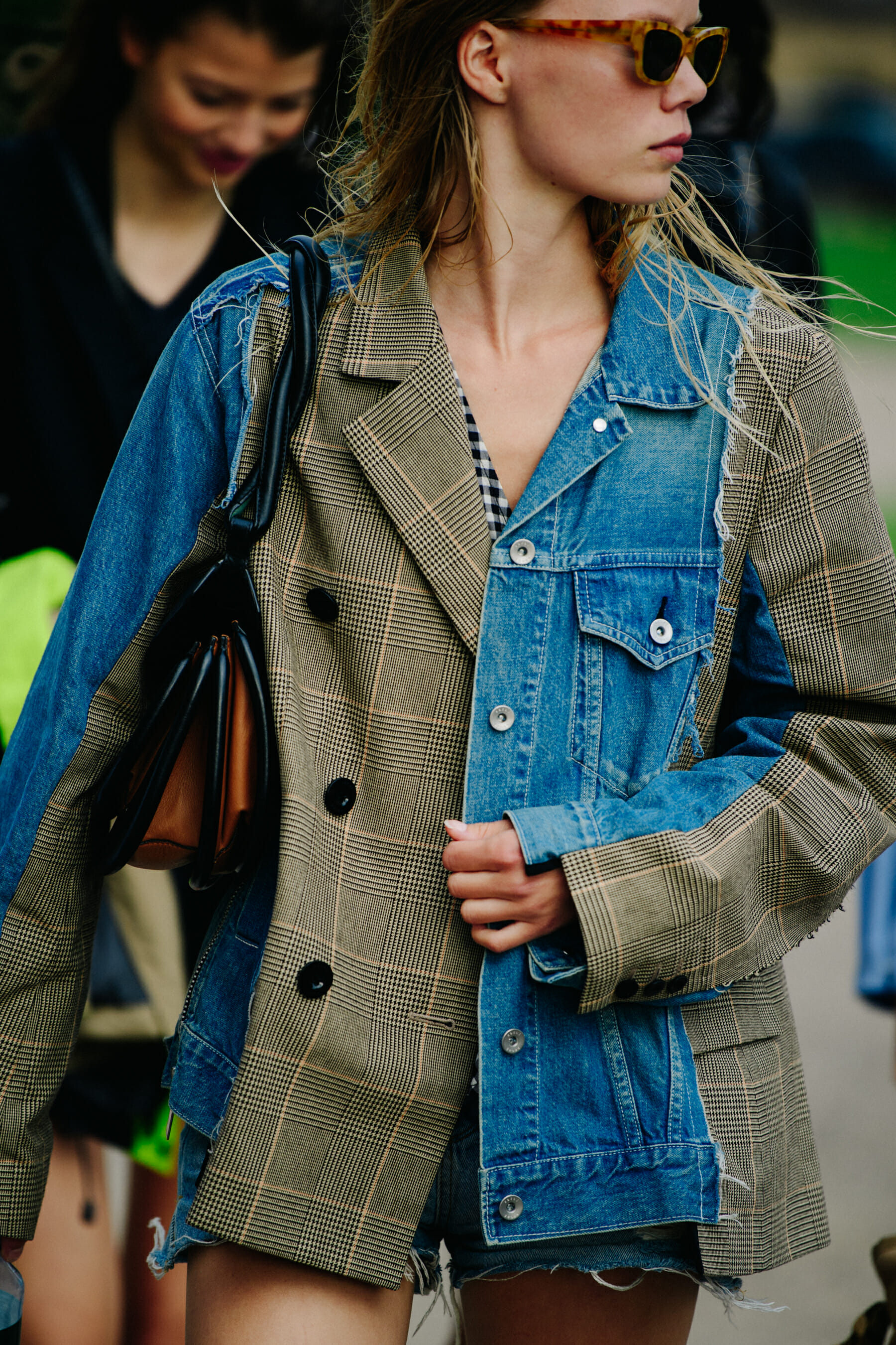Woman wearing denim and check top