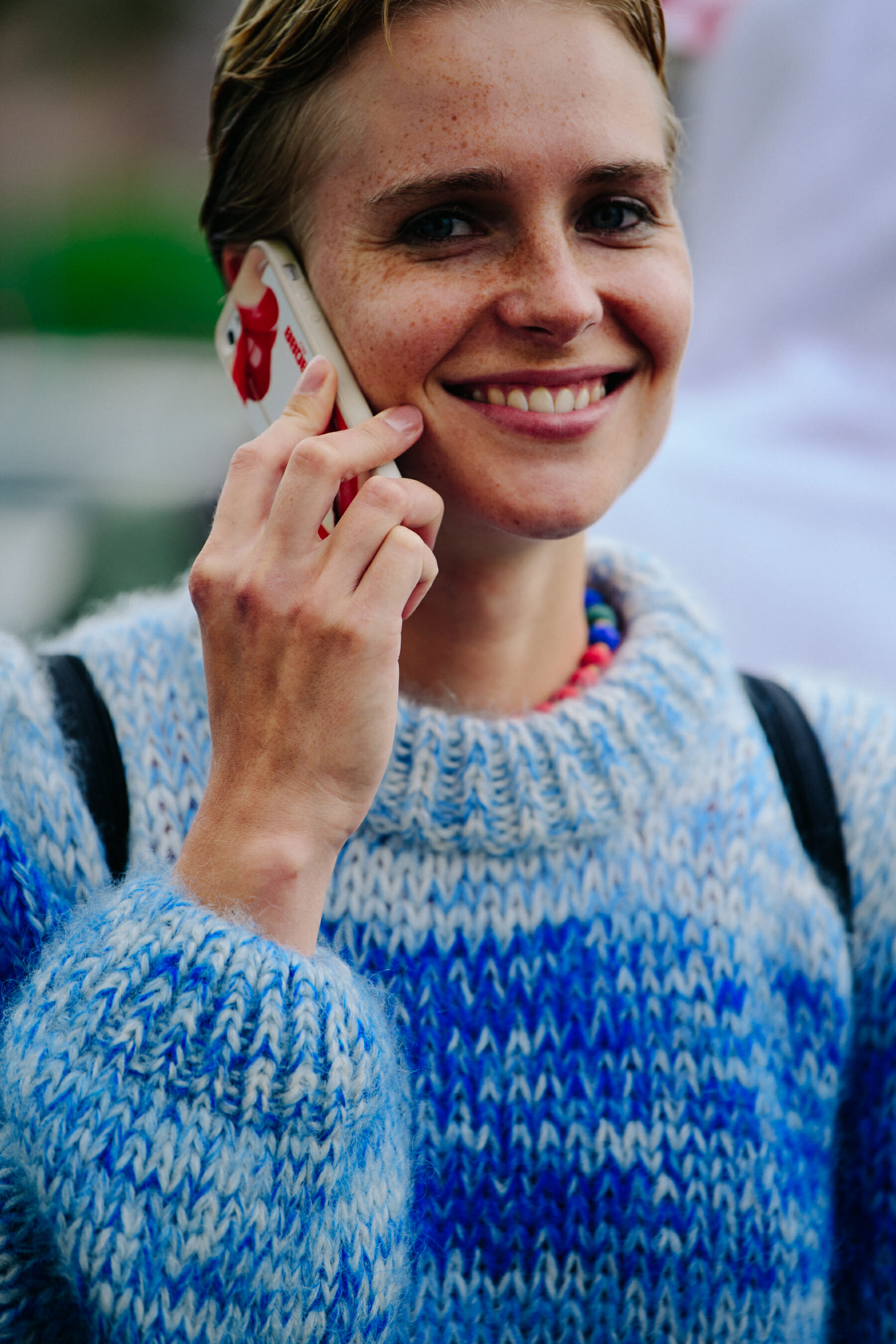 Woman wearing blue jumper