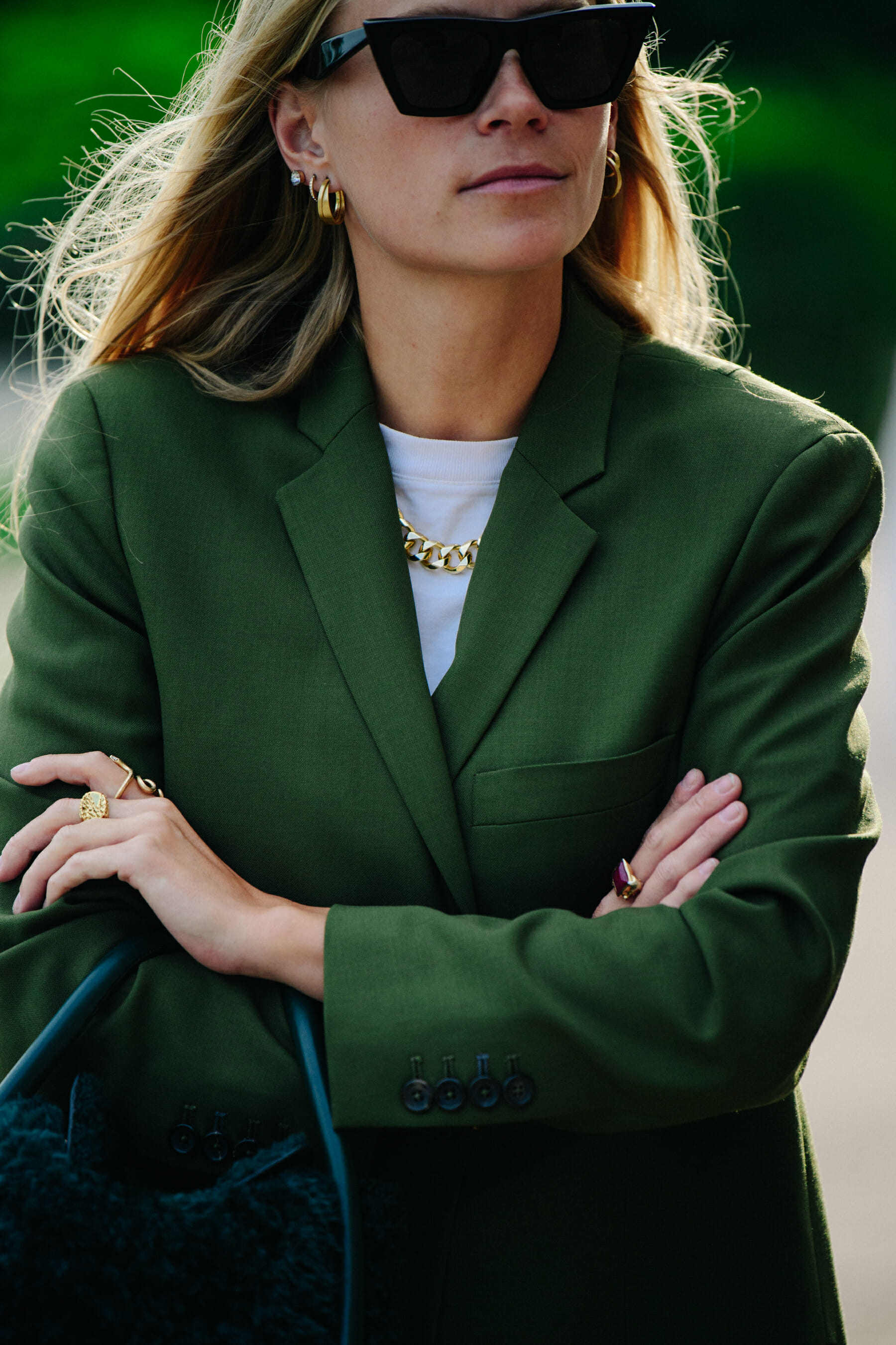 Woman wearing green blazer