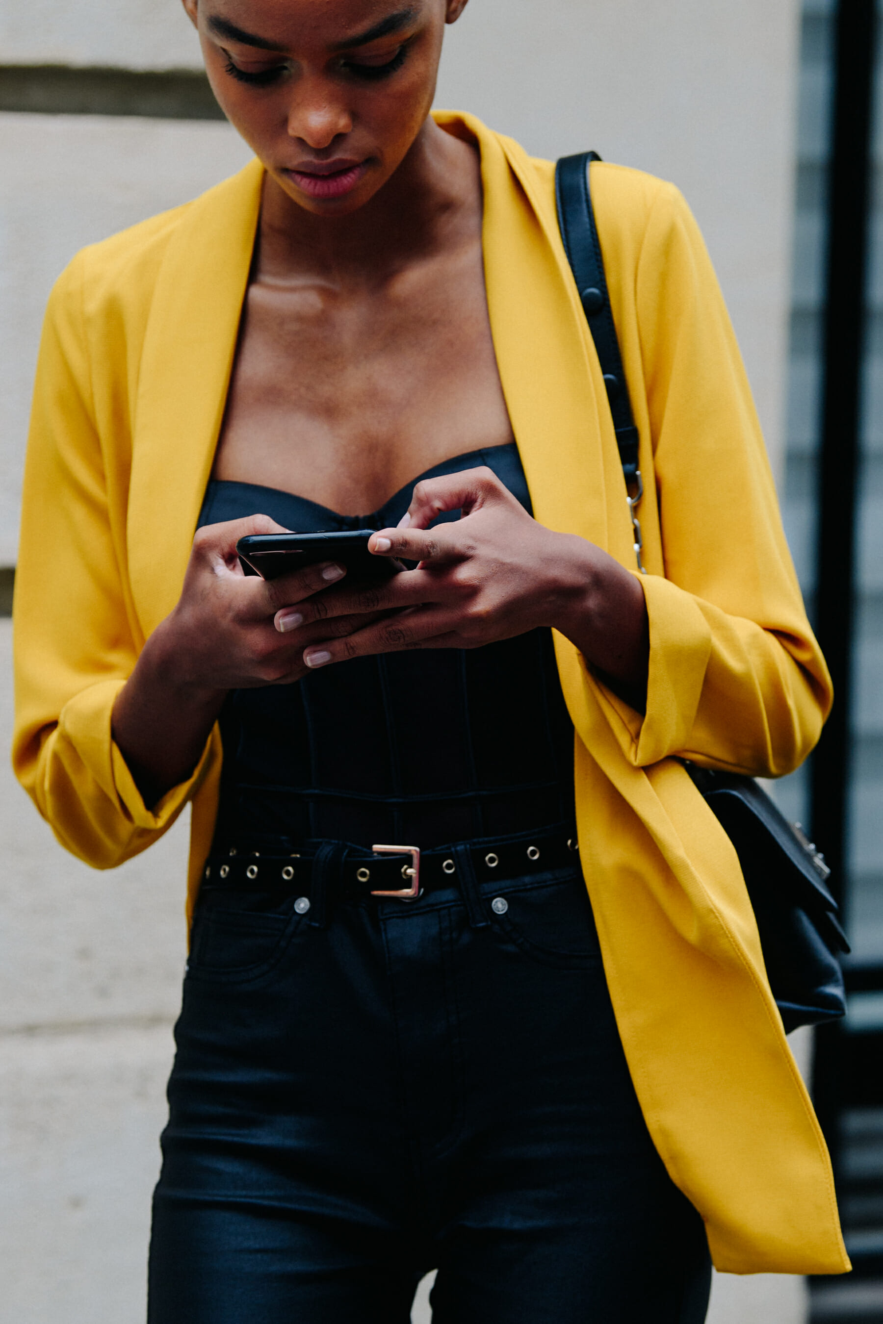 Model wearing yellow jacket