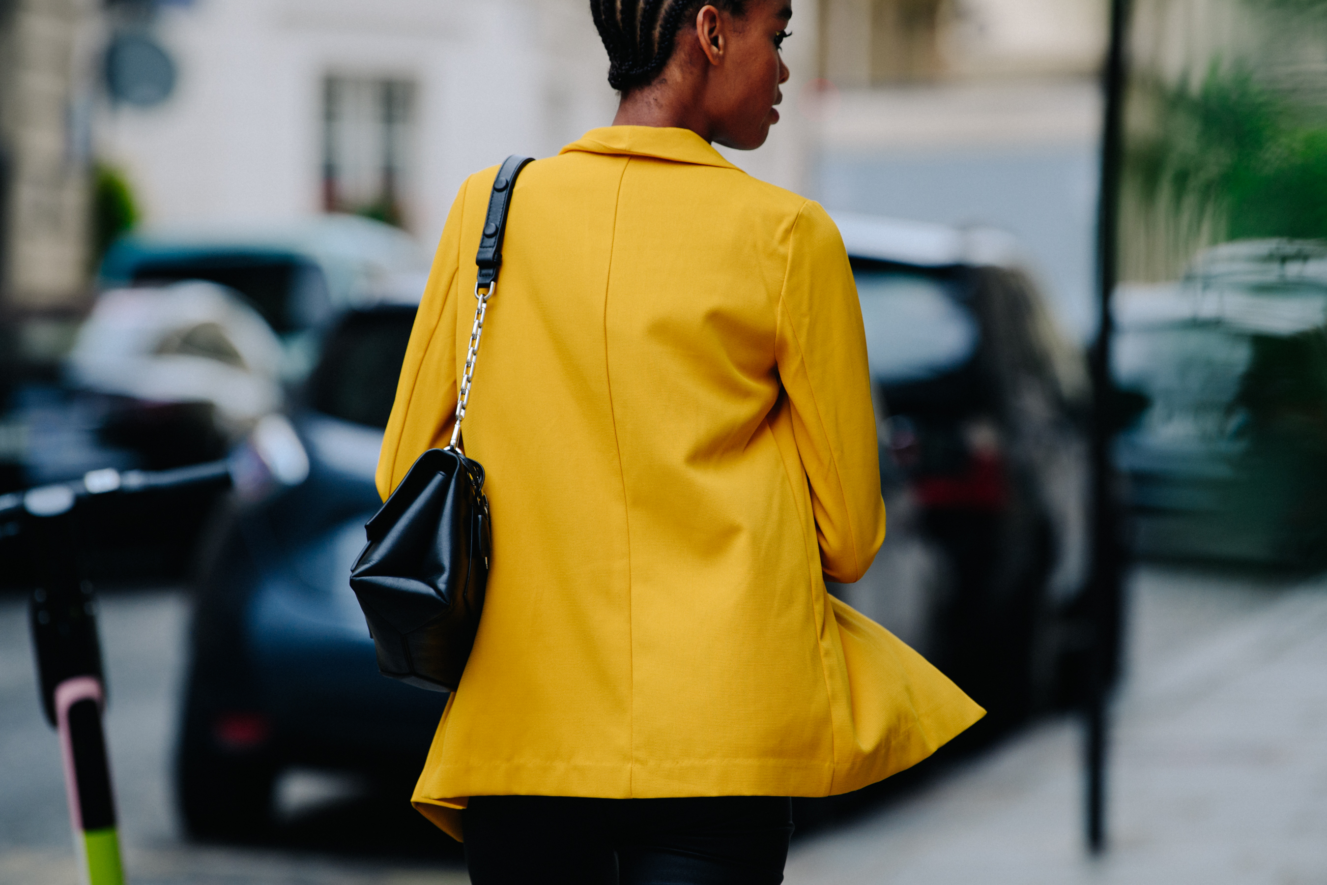 Model wearing yellow jacket