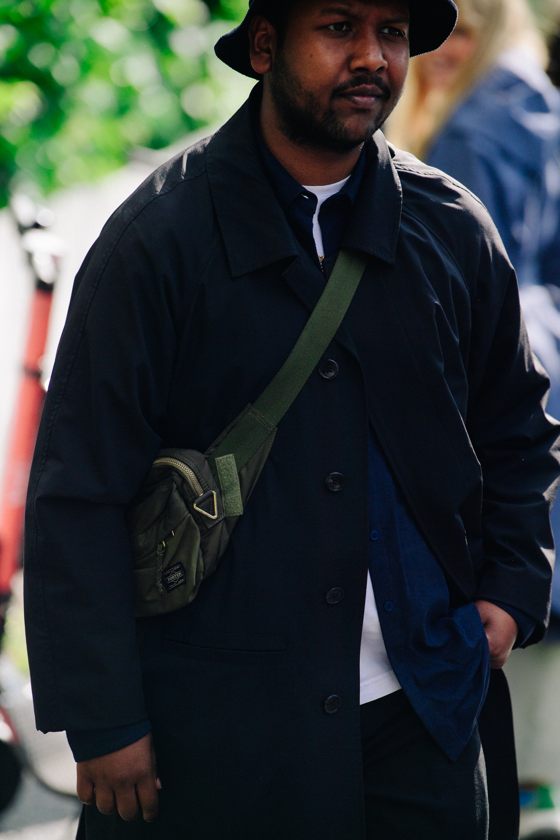Man wearing Porter bag
