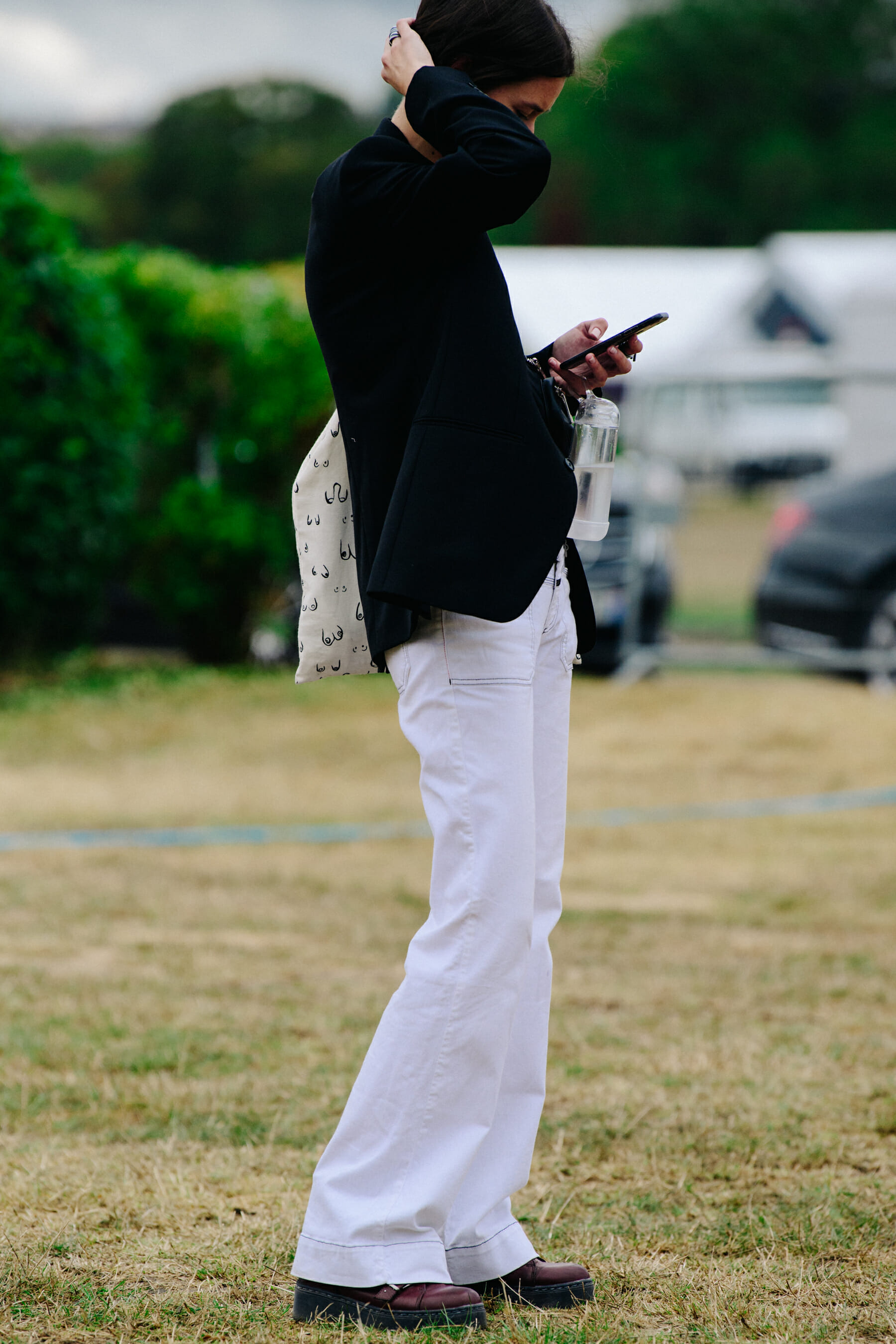 Model wearing white jeans