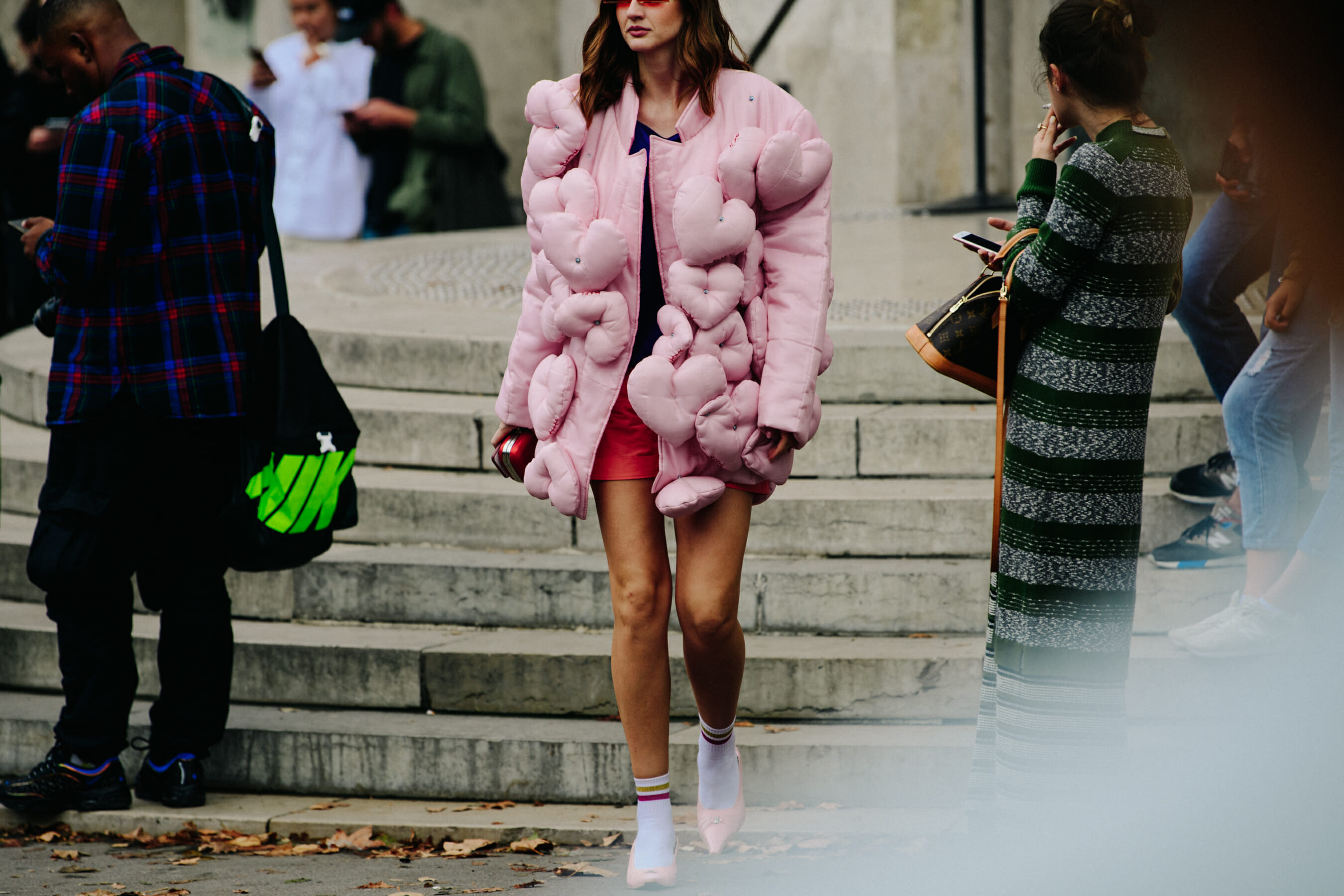 Woman wearing pink jacket
