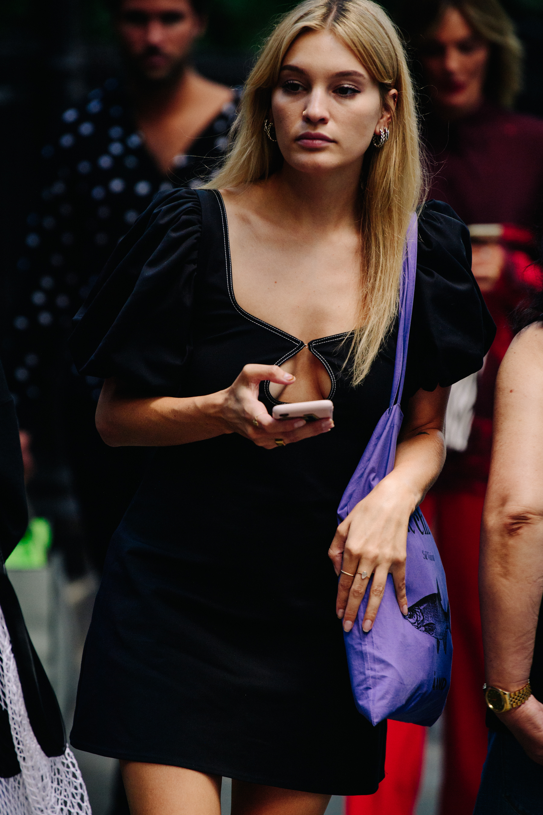 Woman wearing black dress