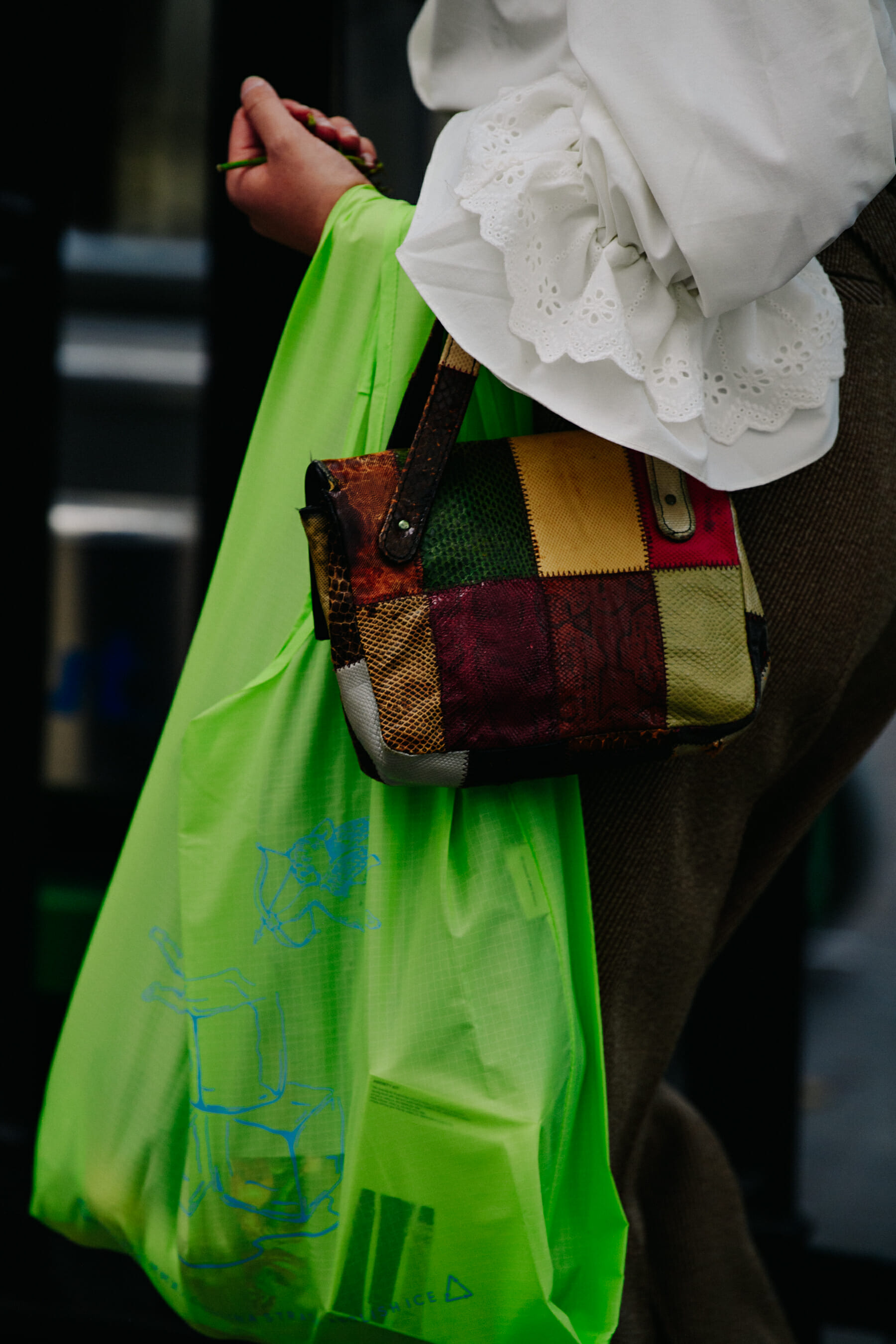 Woman carrying green bag