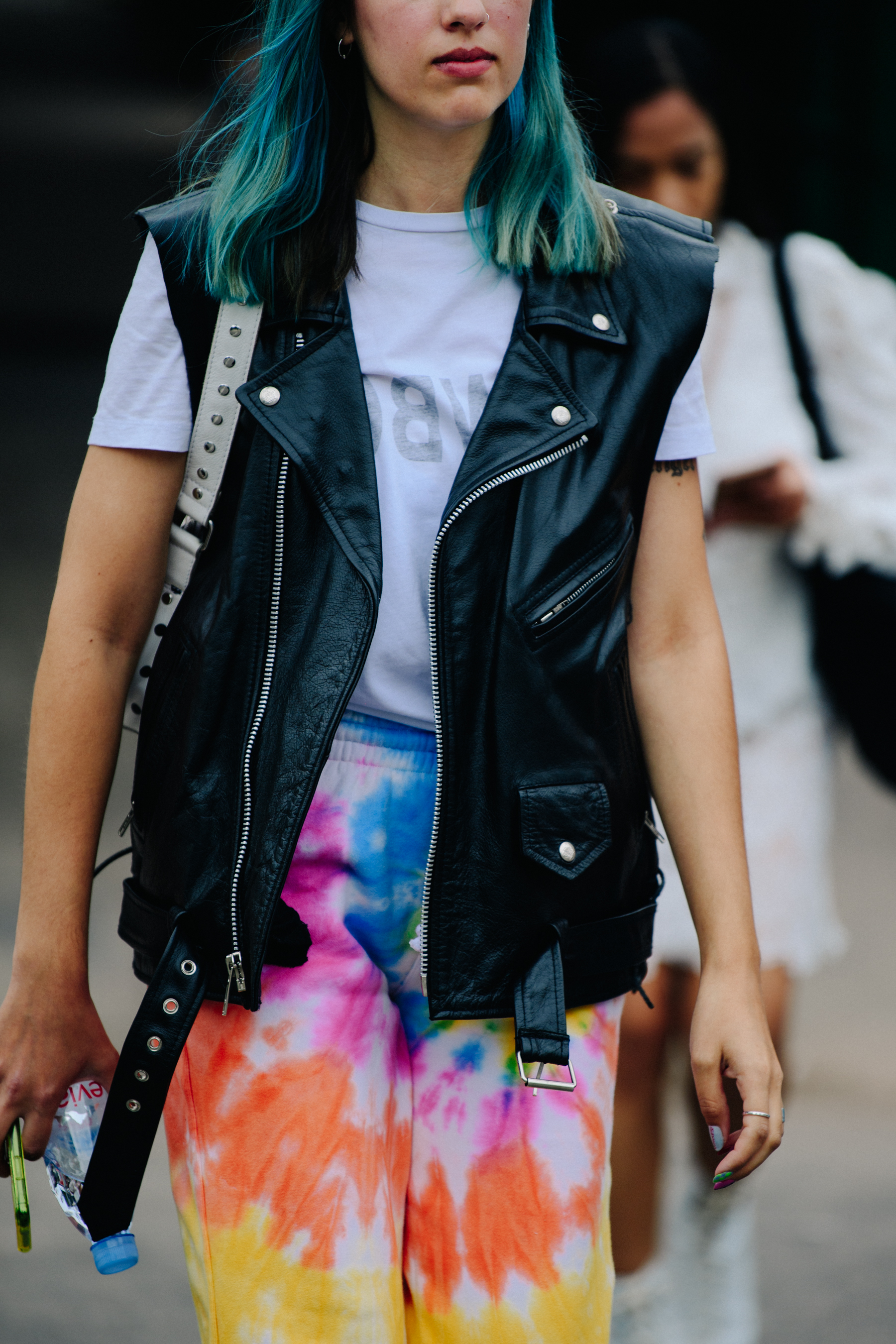 Woman wearing leather vest