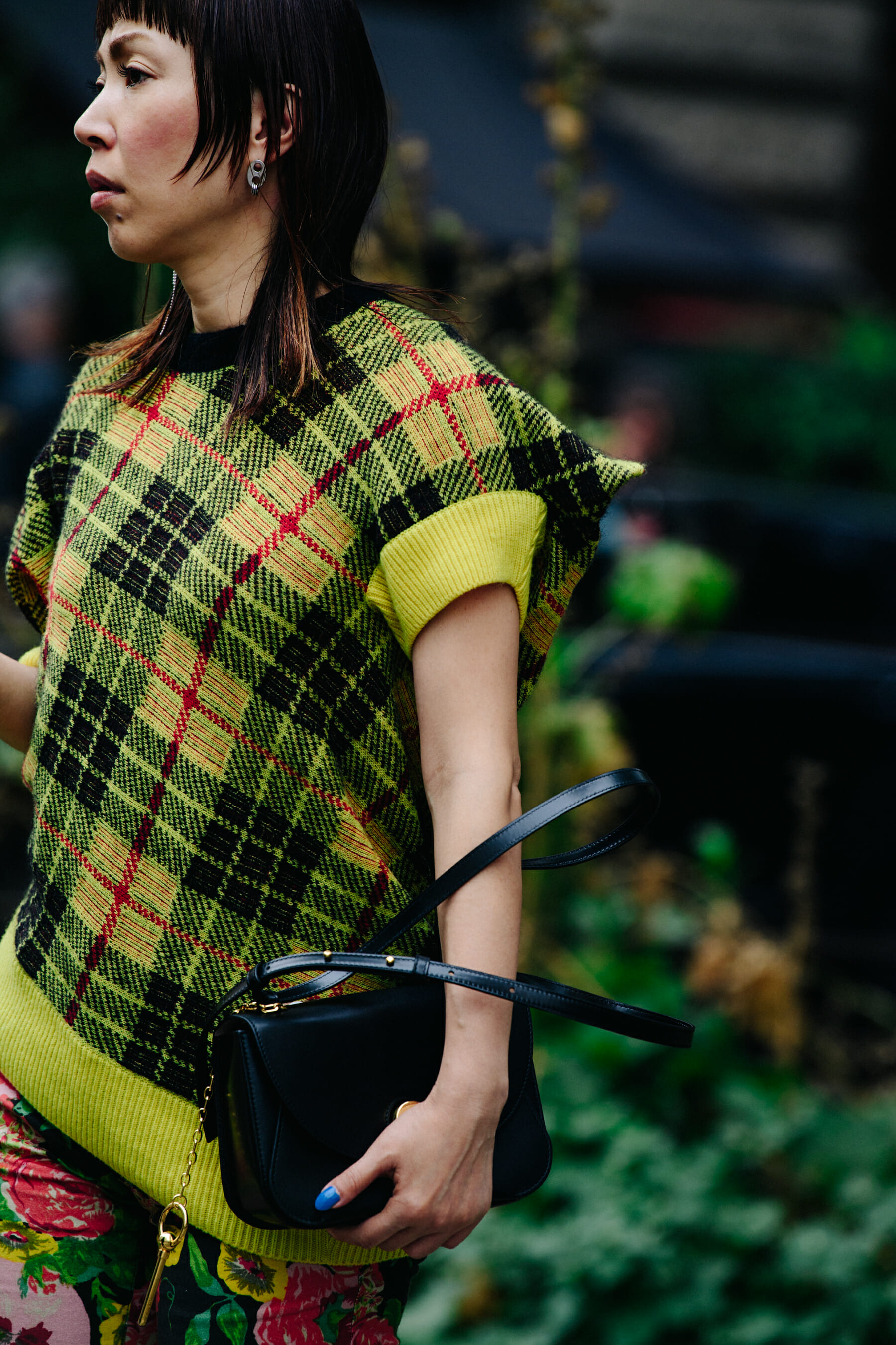 Woman wearing yellow jumper