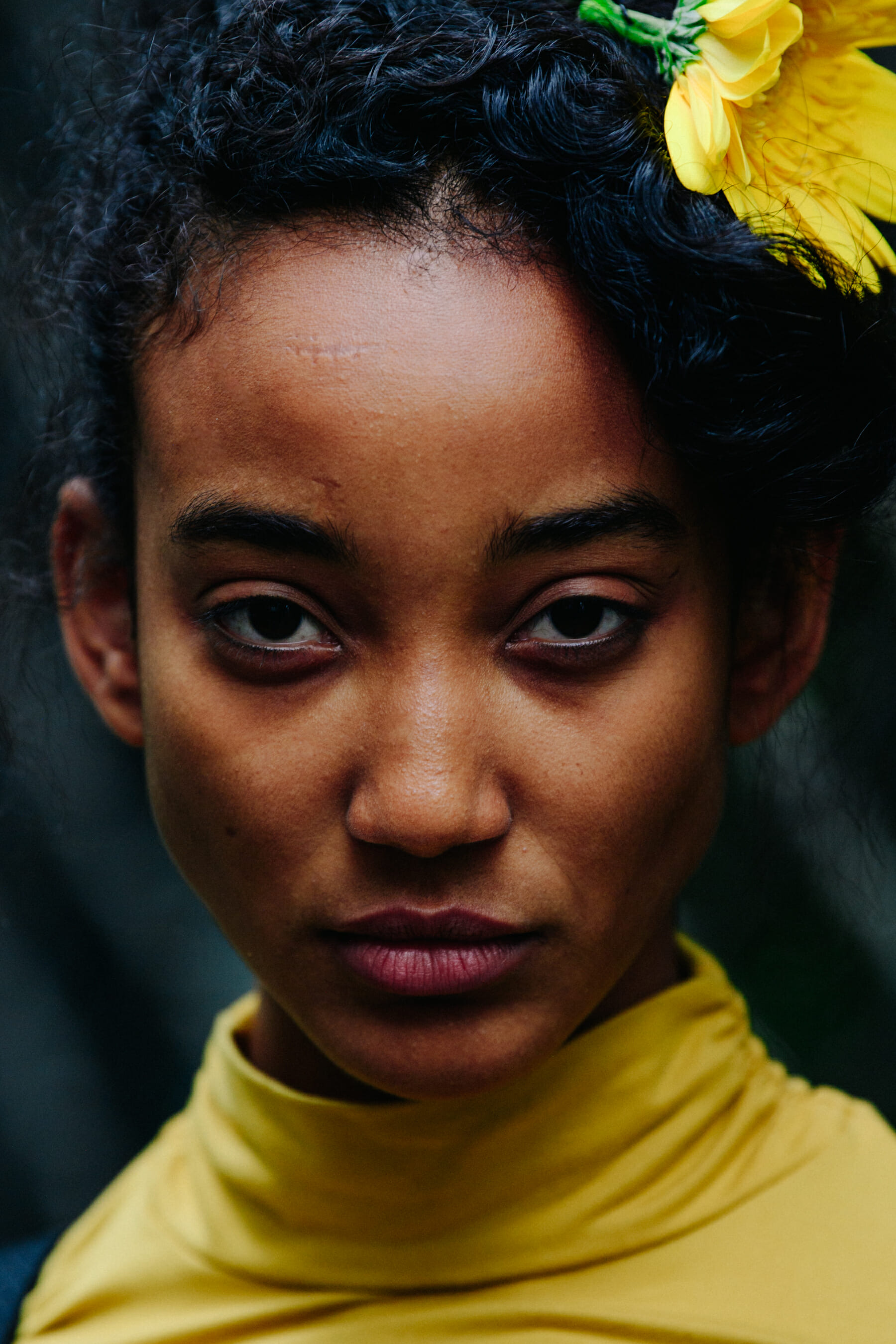 Portrait of model wearing flower in hair