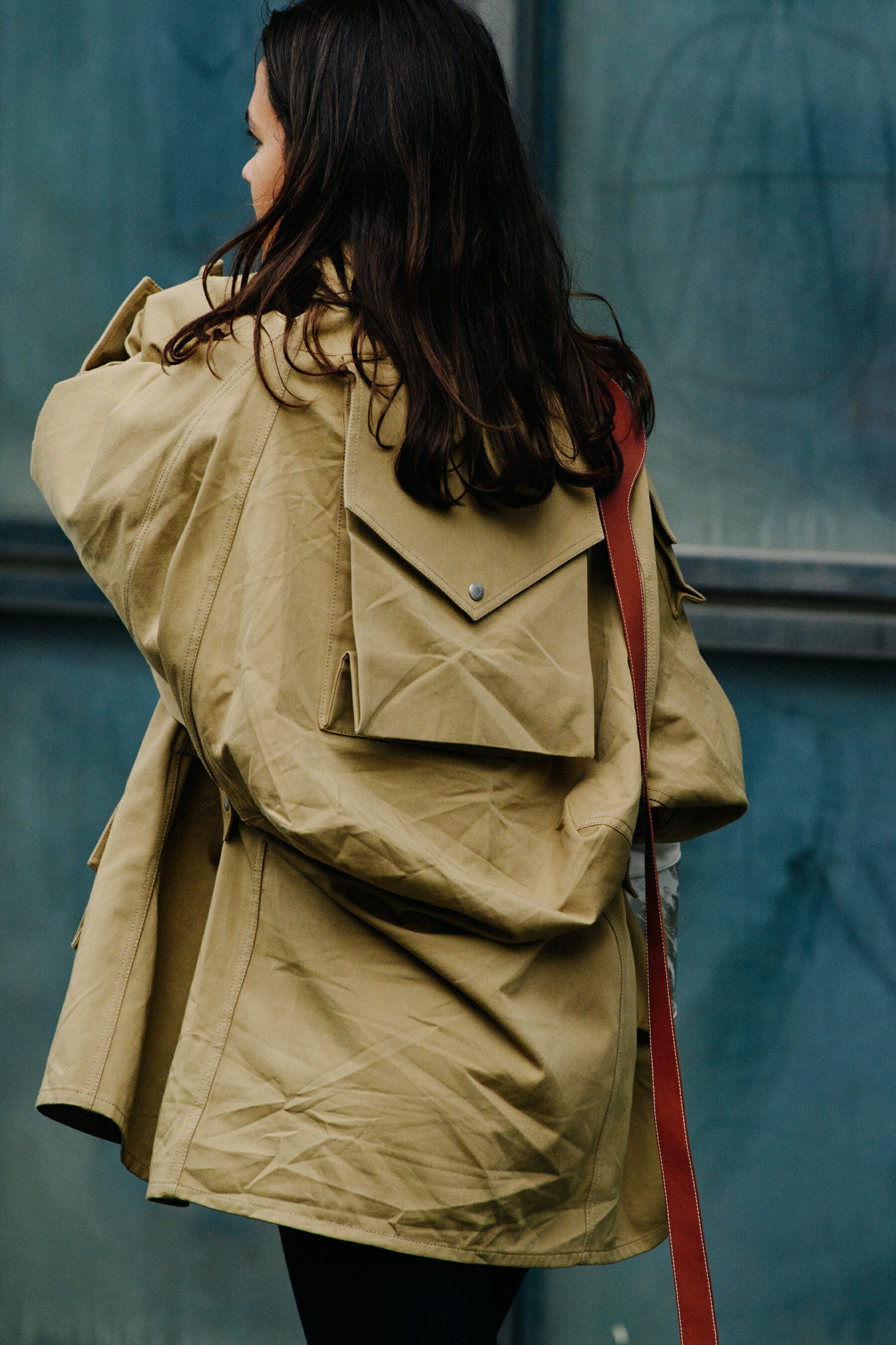 Woman wearing tan coat