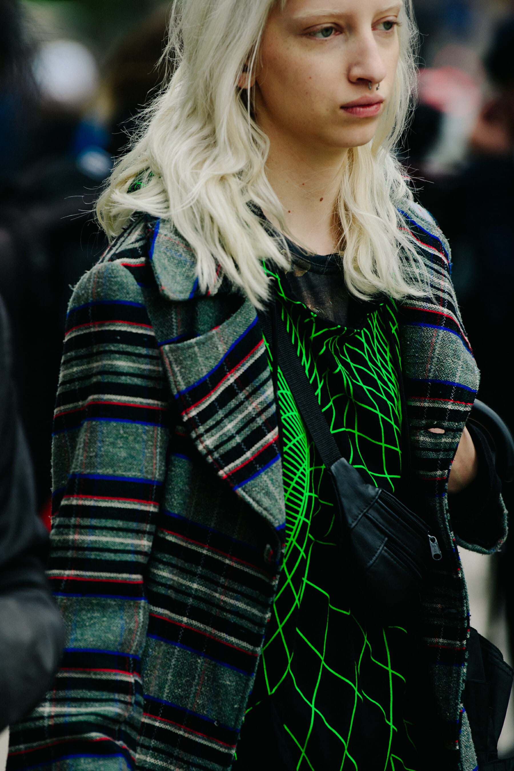 Model wearing striped coat