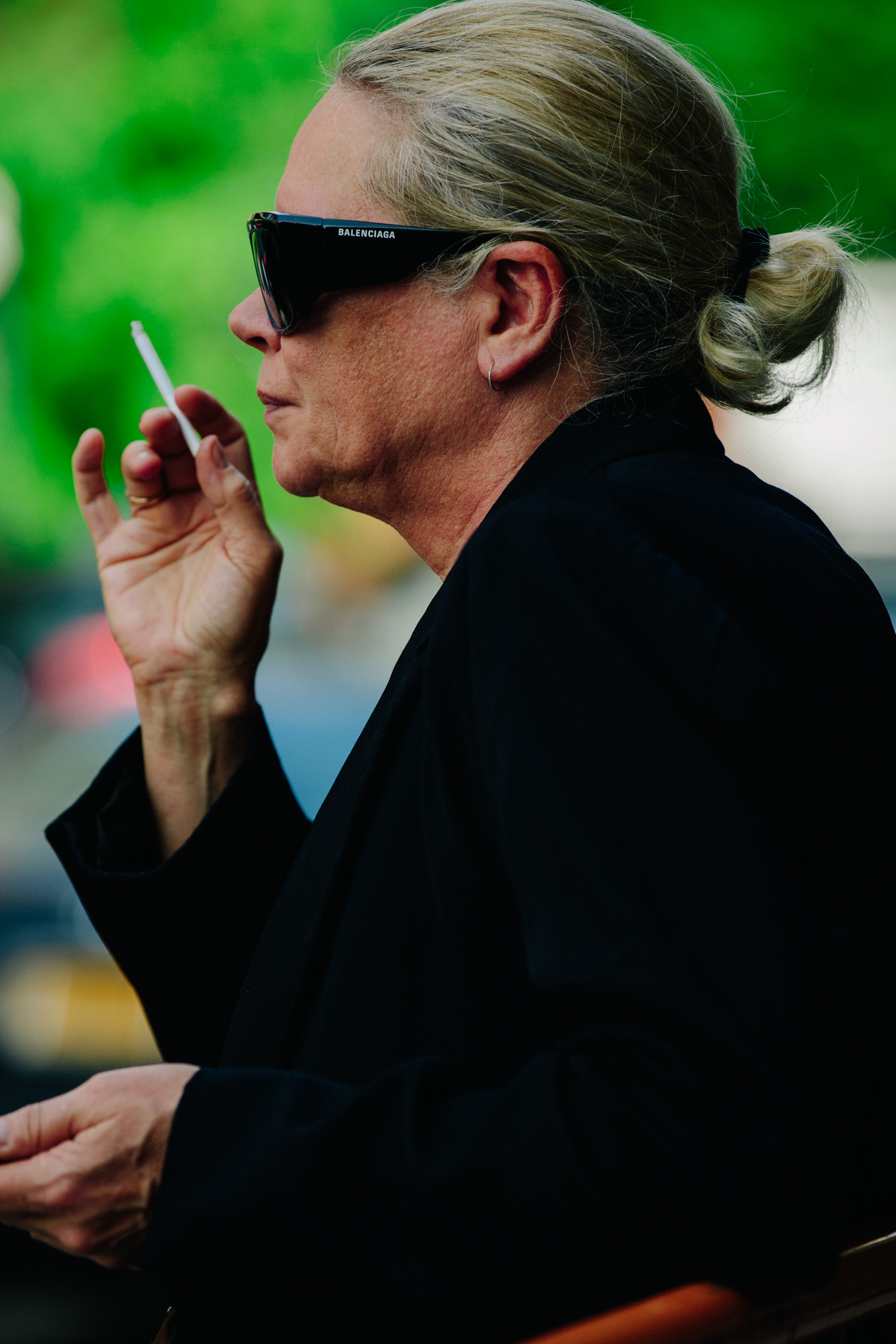 Woman wearing Balenciaga sunglasses
