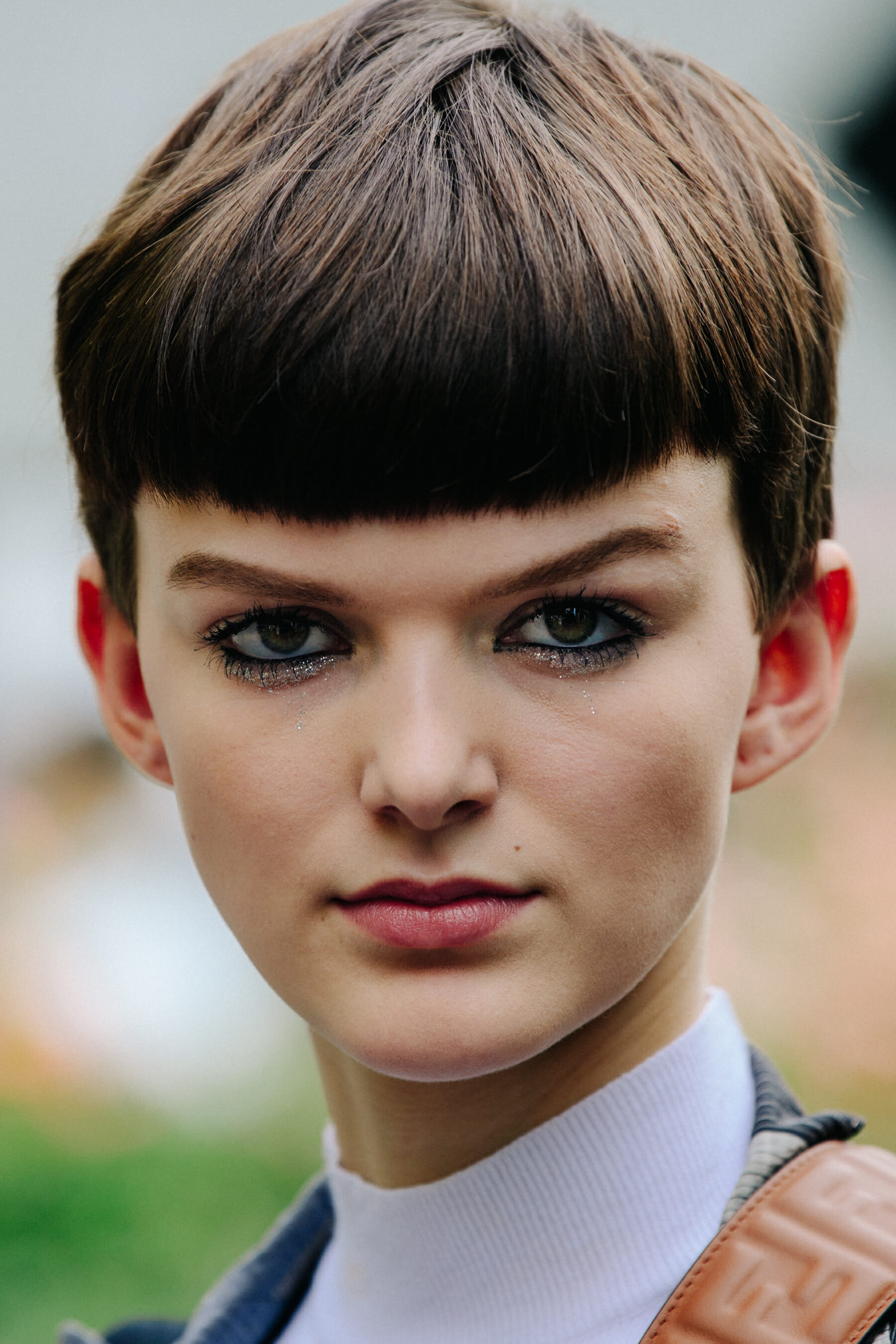 Portrait of model with short brown hair