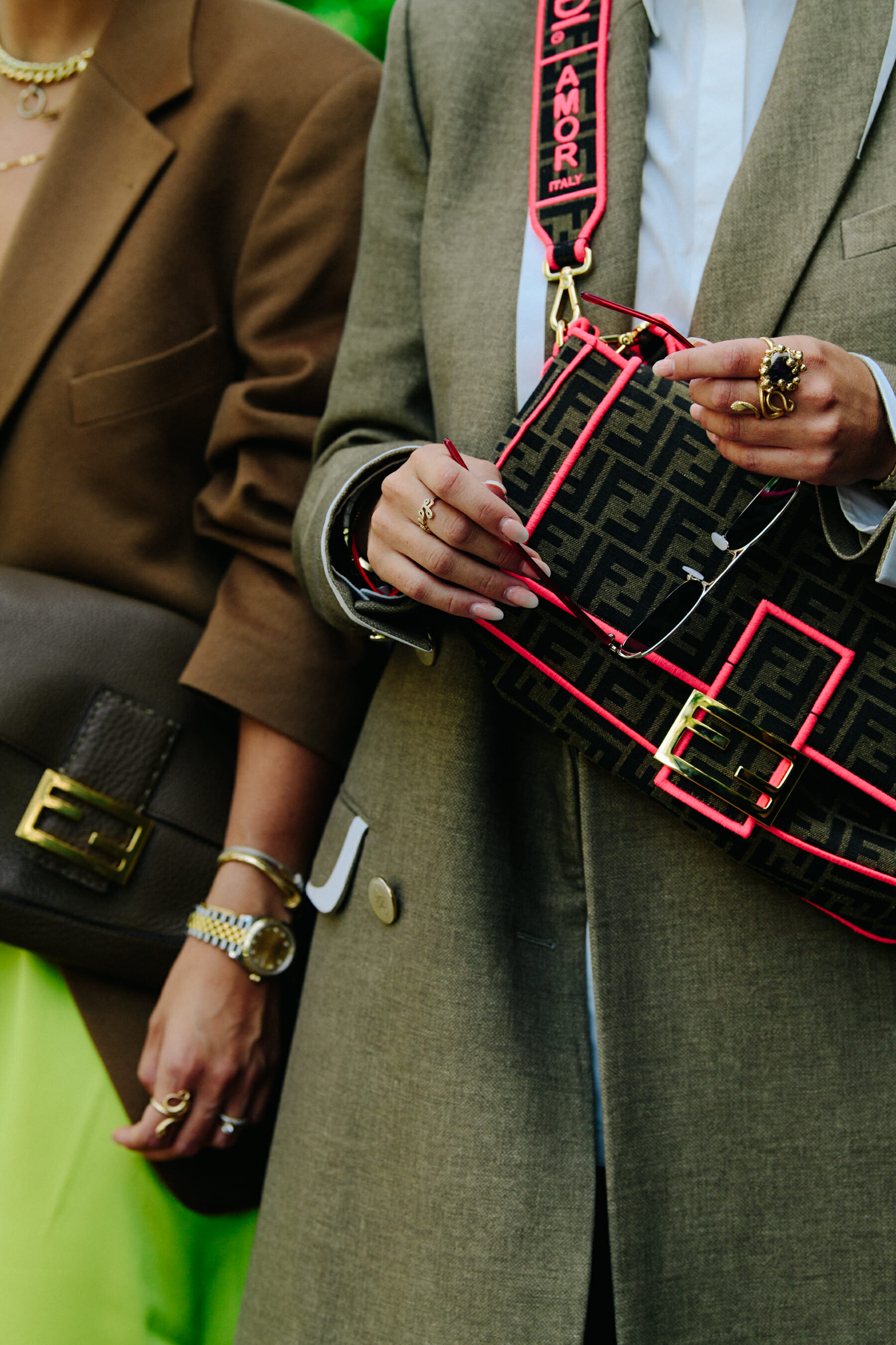 Two women wearing Fendi