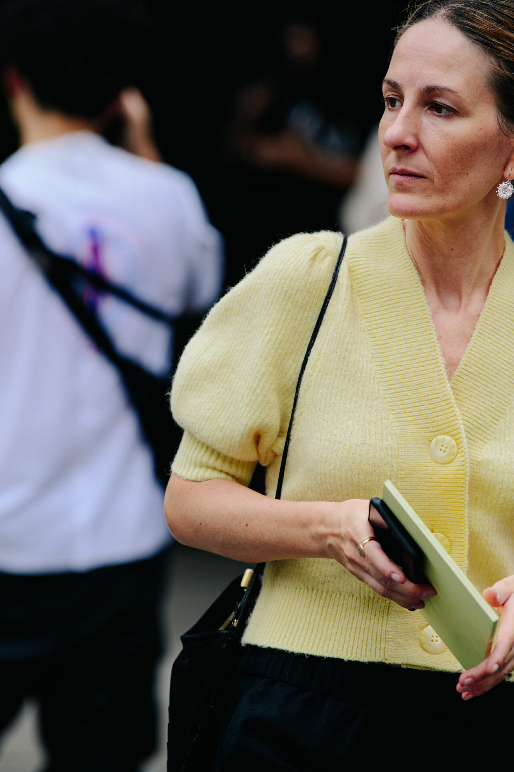 Woman wearing yellow wool jumper