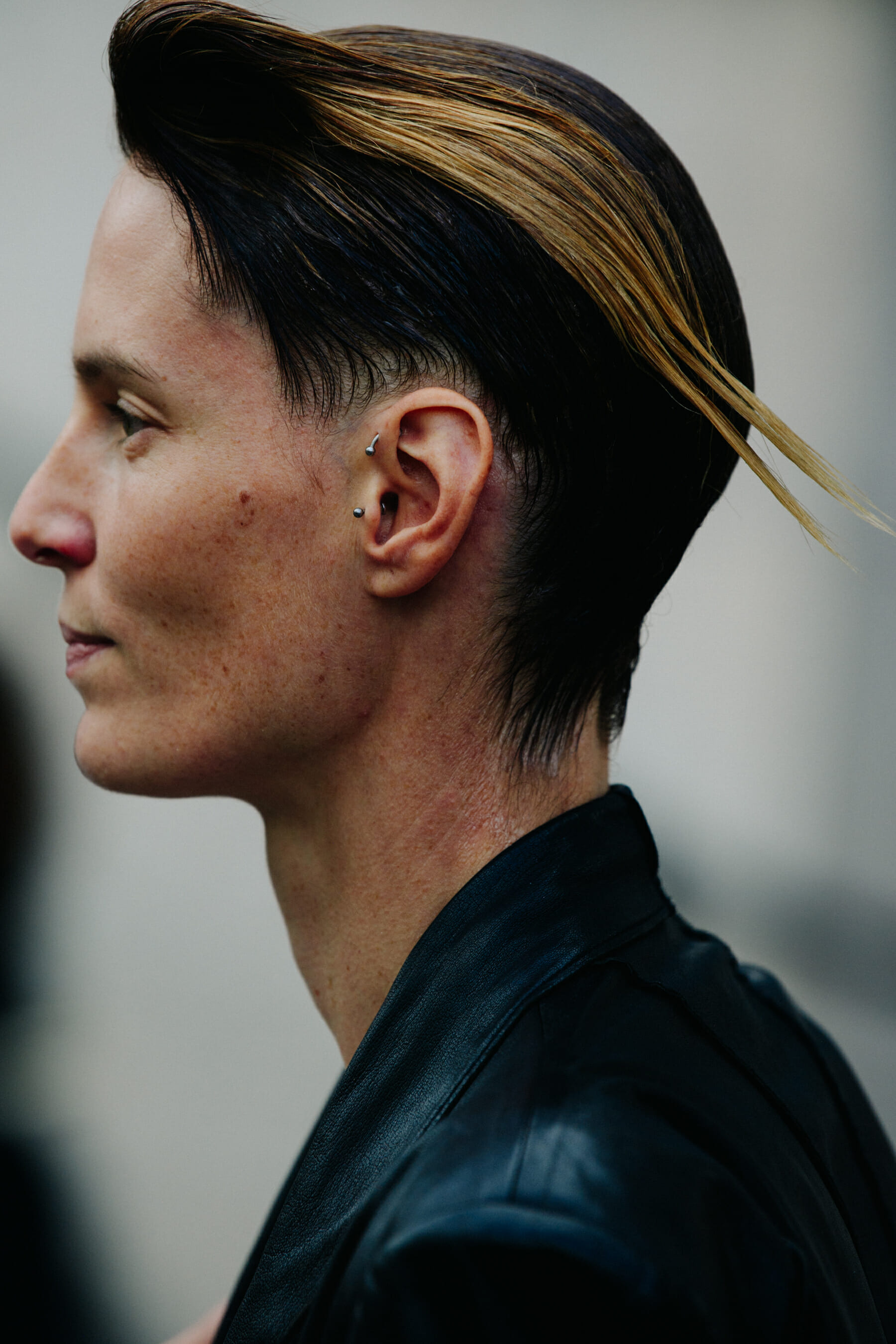 Model with ear piercings