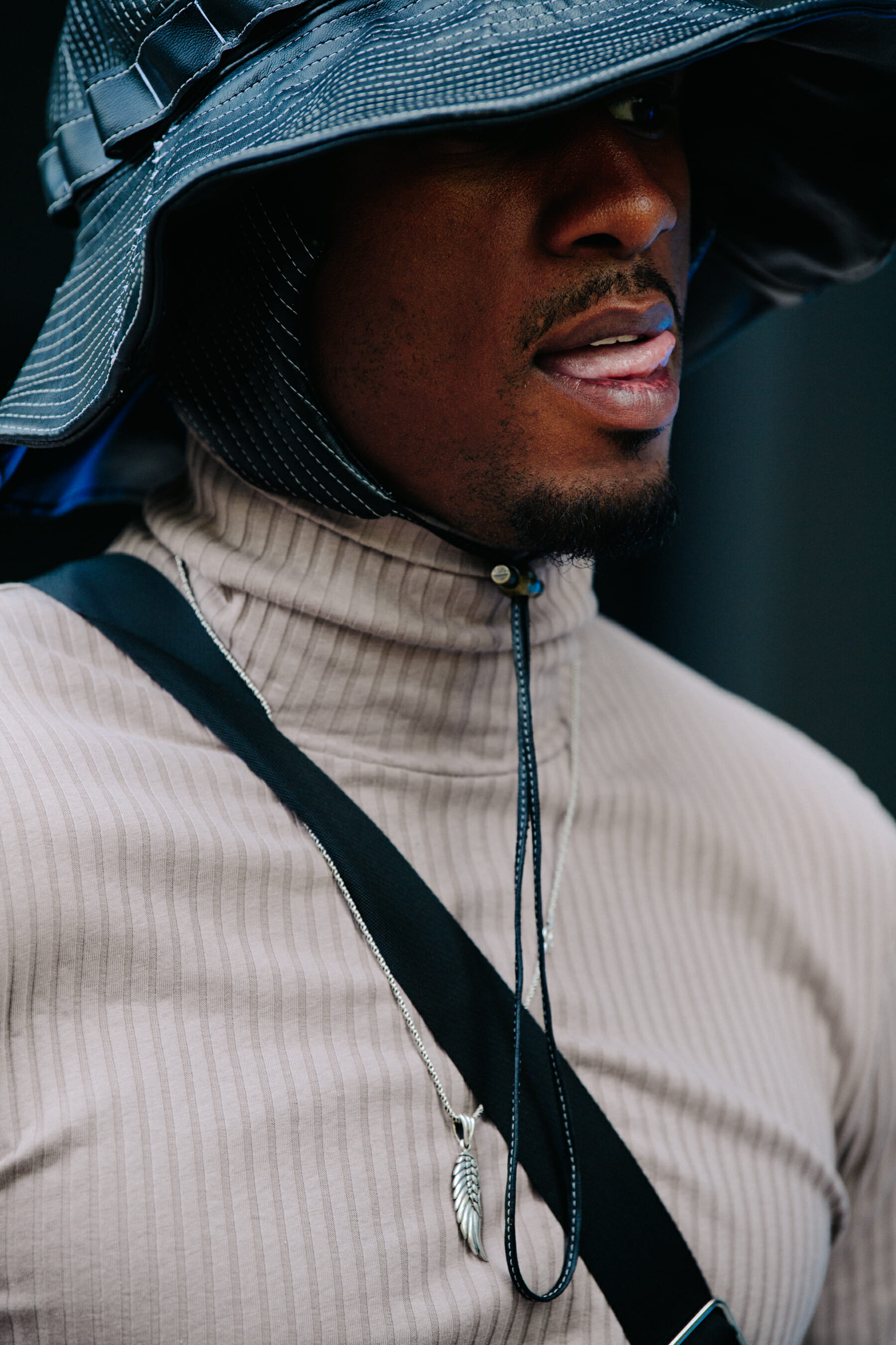 Man wearing black bucket hat