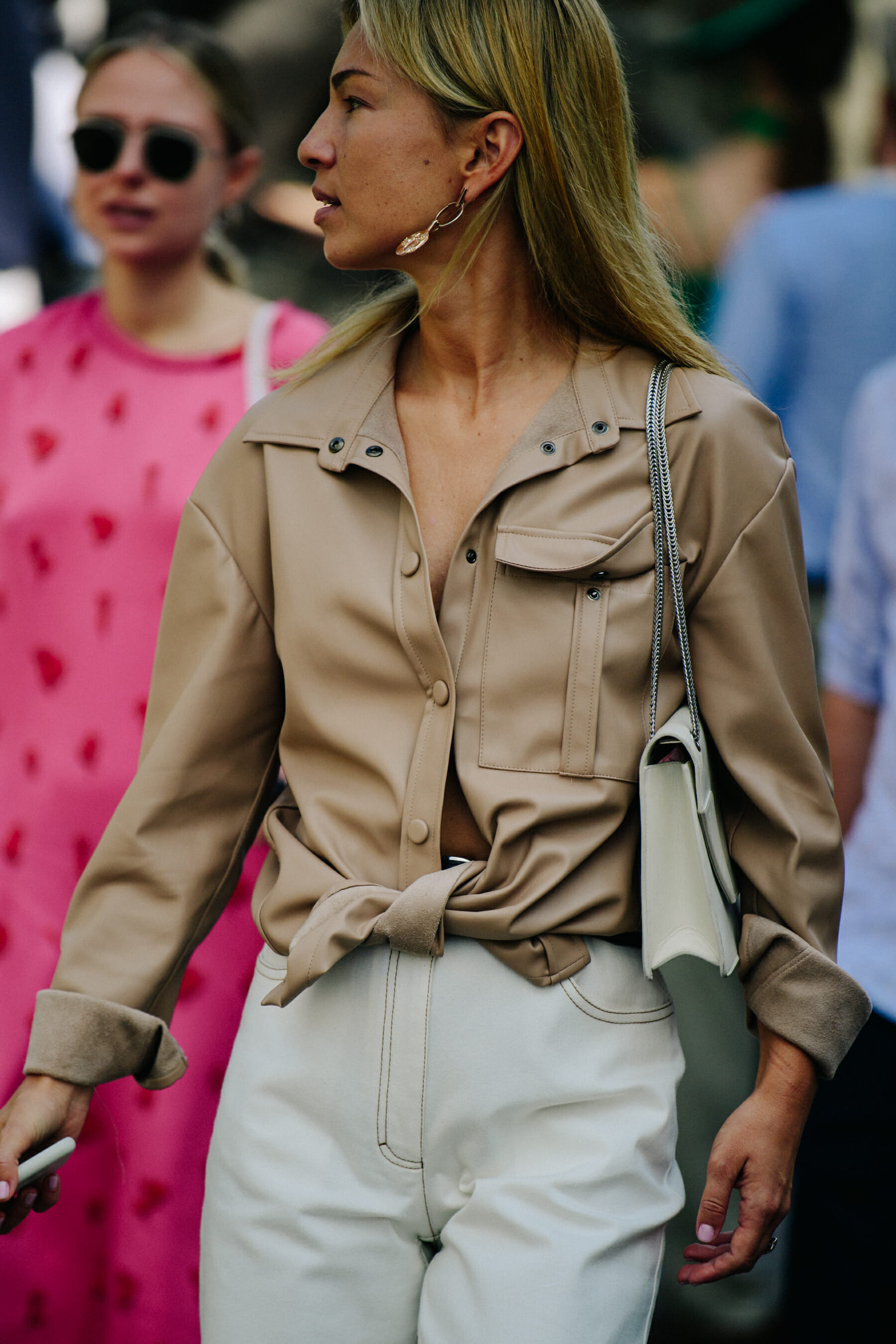 Woman wearing tan leather shirt