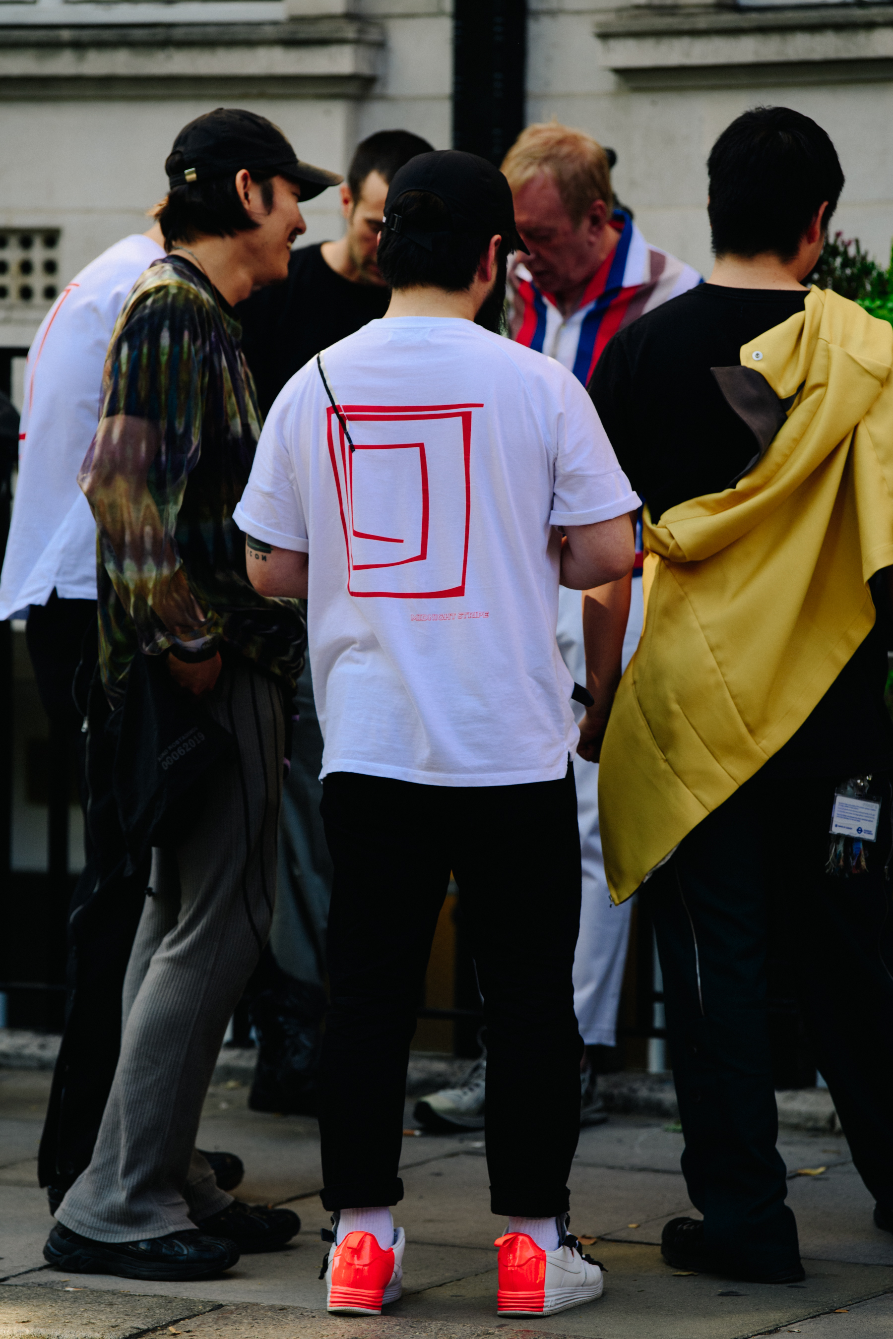 Man wearing Nike x Acronym sneakers