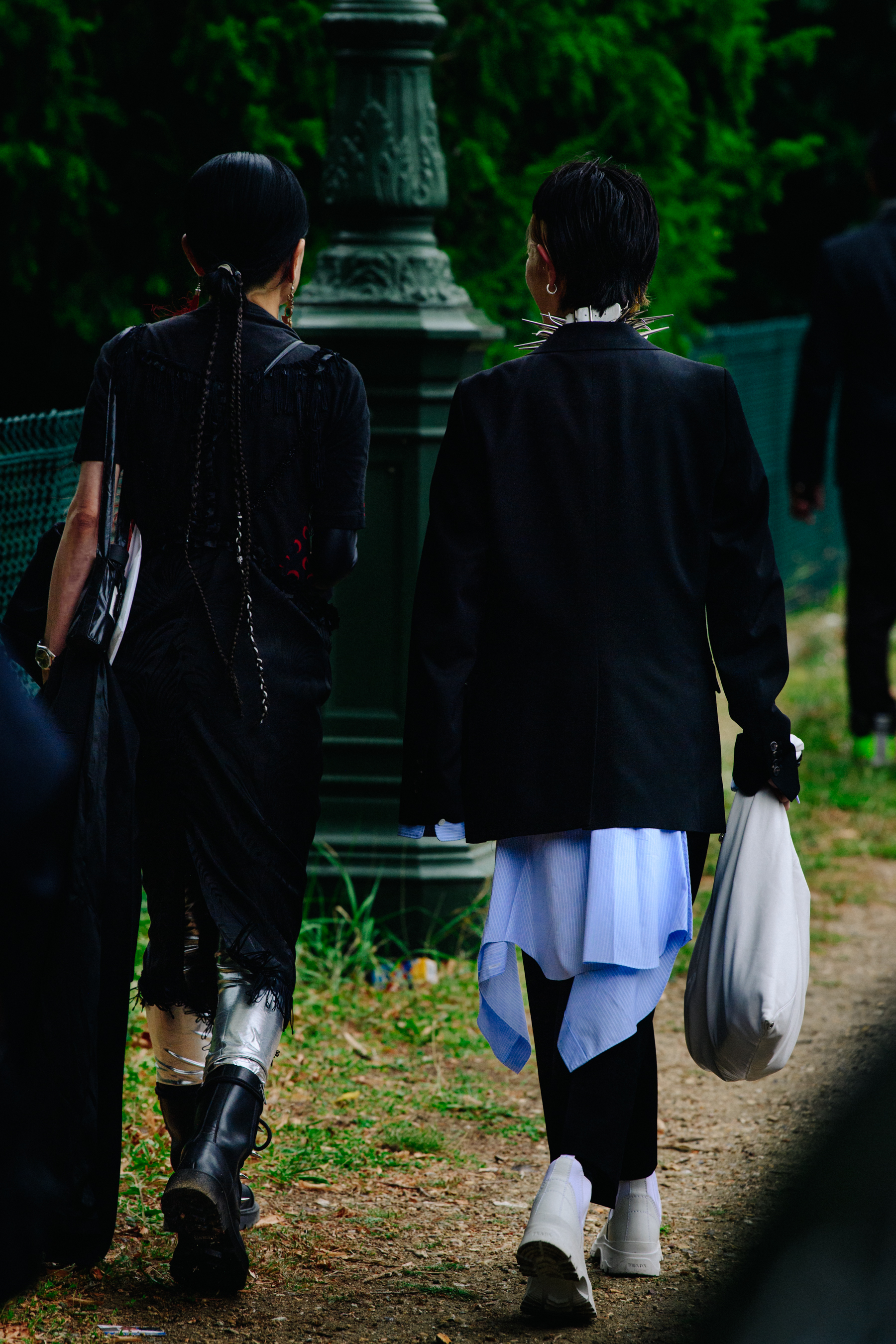 Two women wearing black jackets