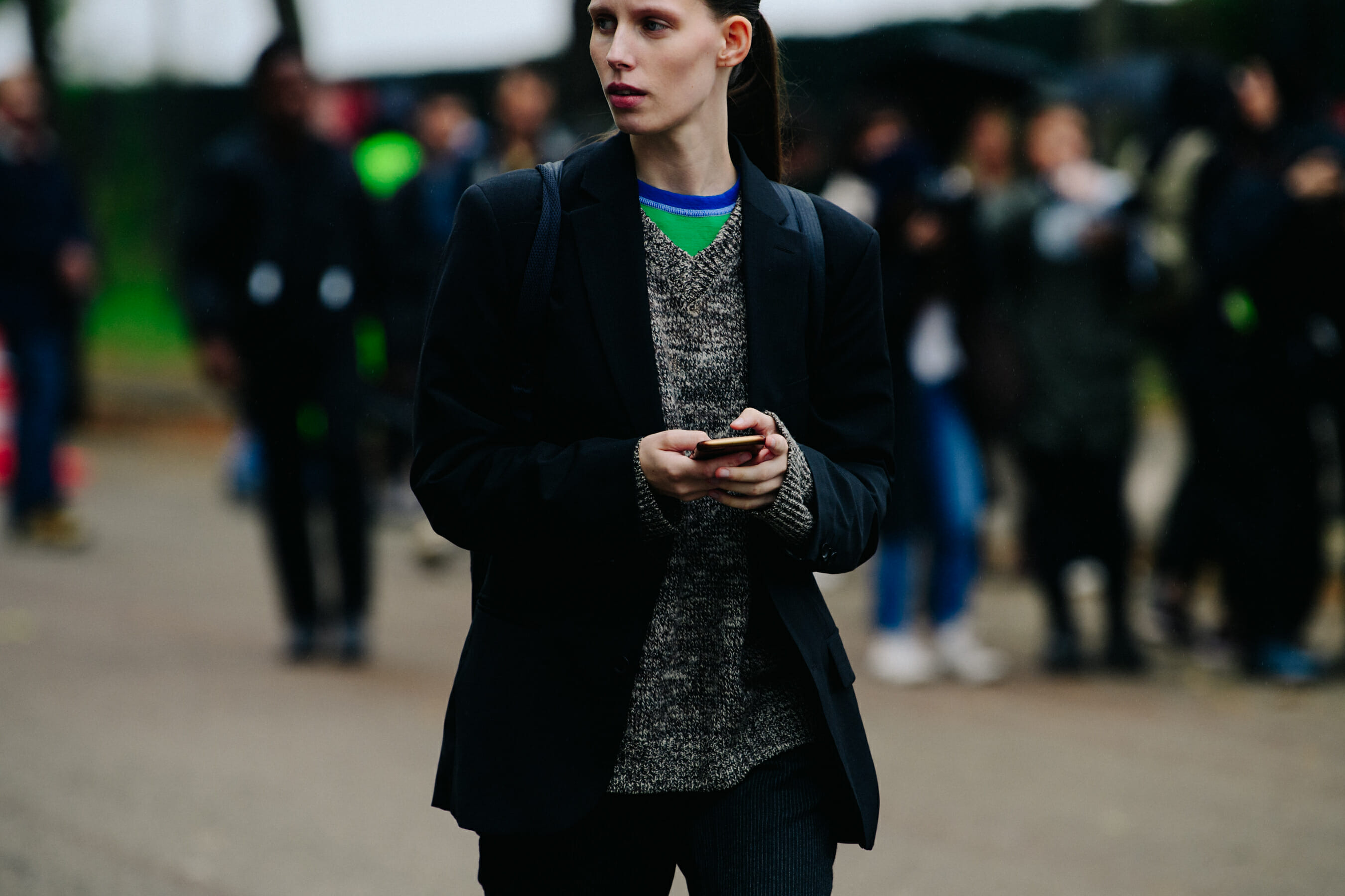Woman wearing grey jumper