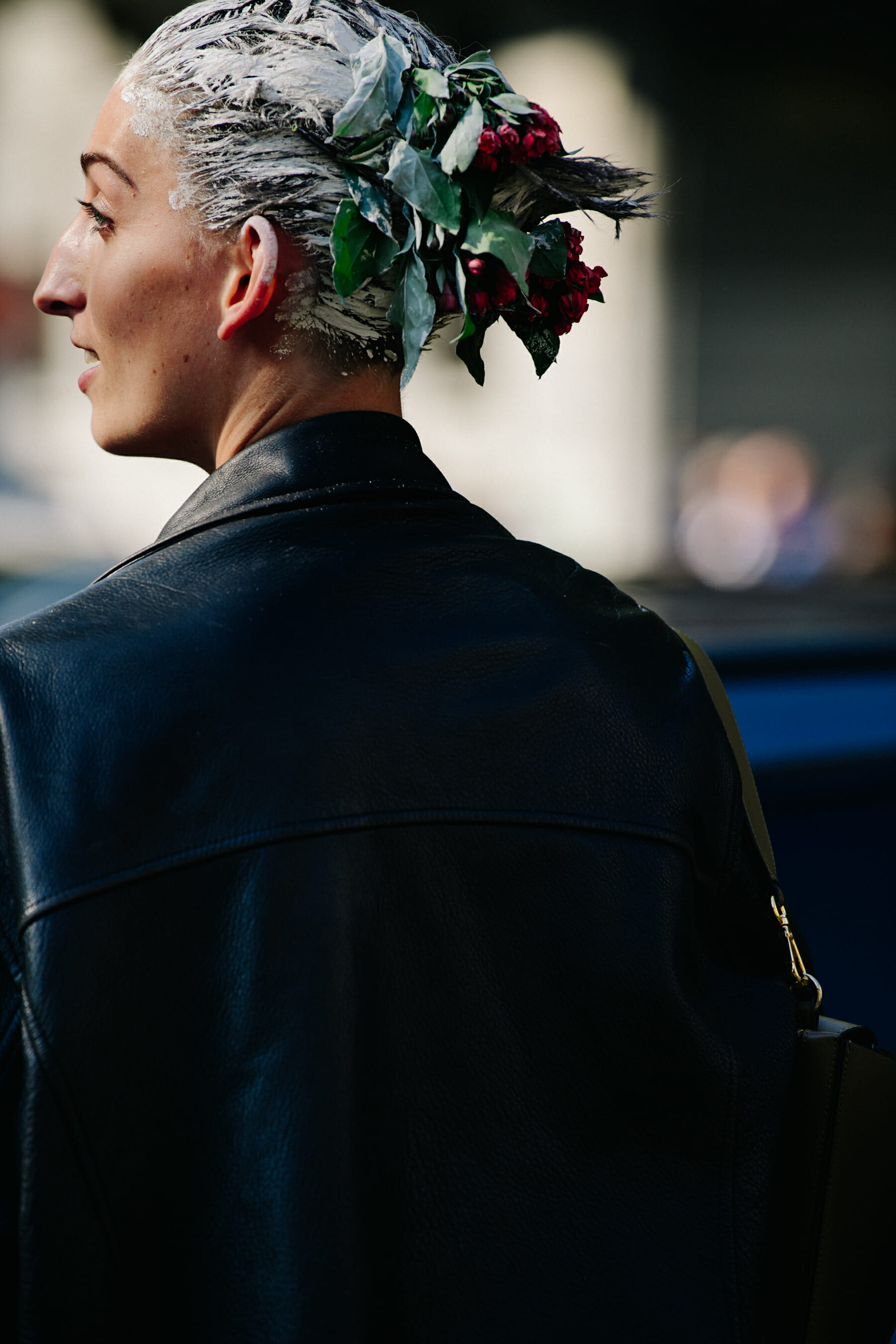 Woman wearing roses in hair