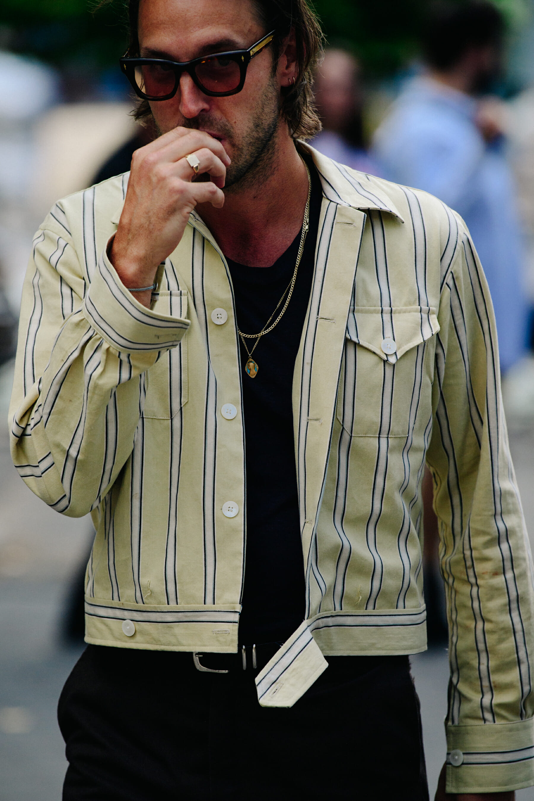Man wearing striped jacket