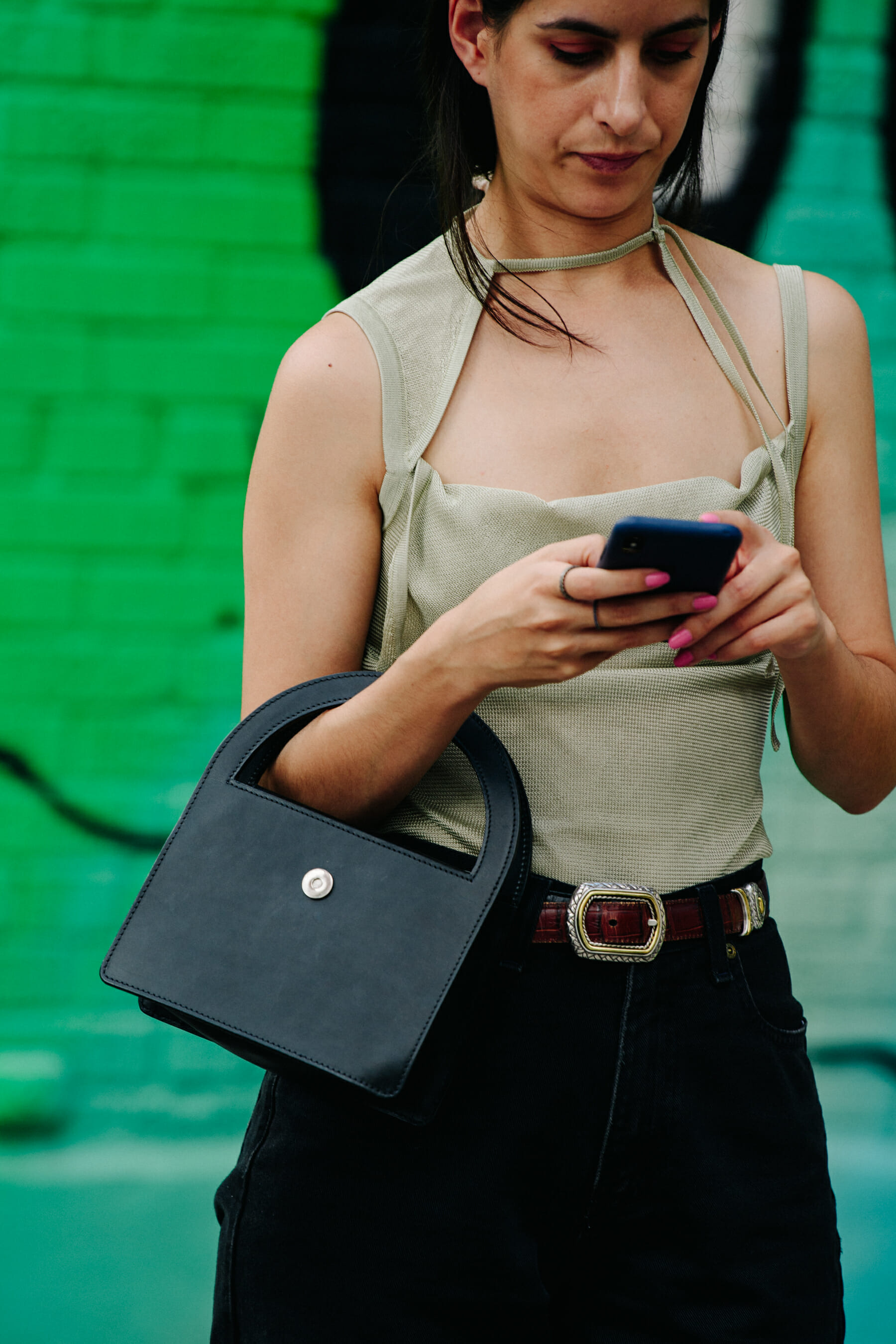 Woman wearing tan shirt
