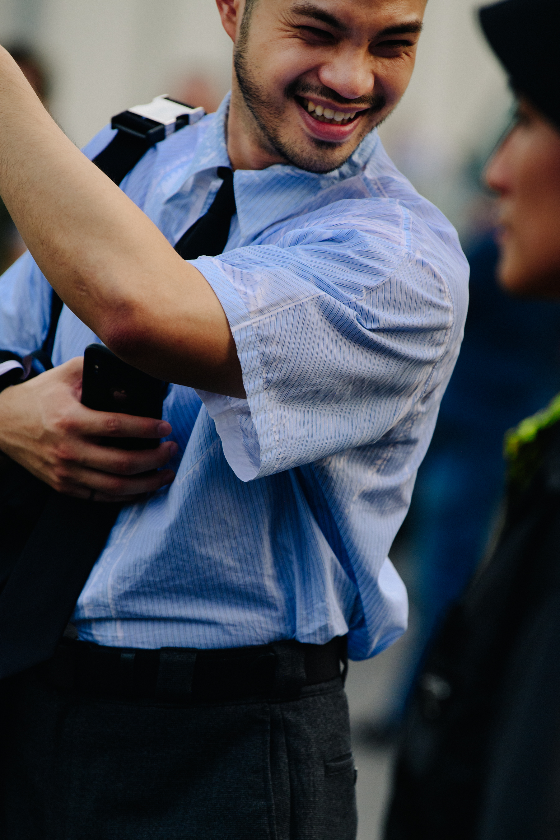 Man wearing Prada shirt
