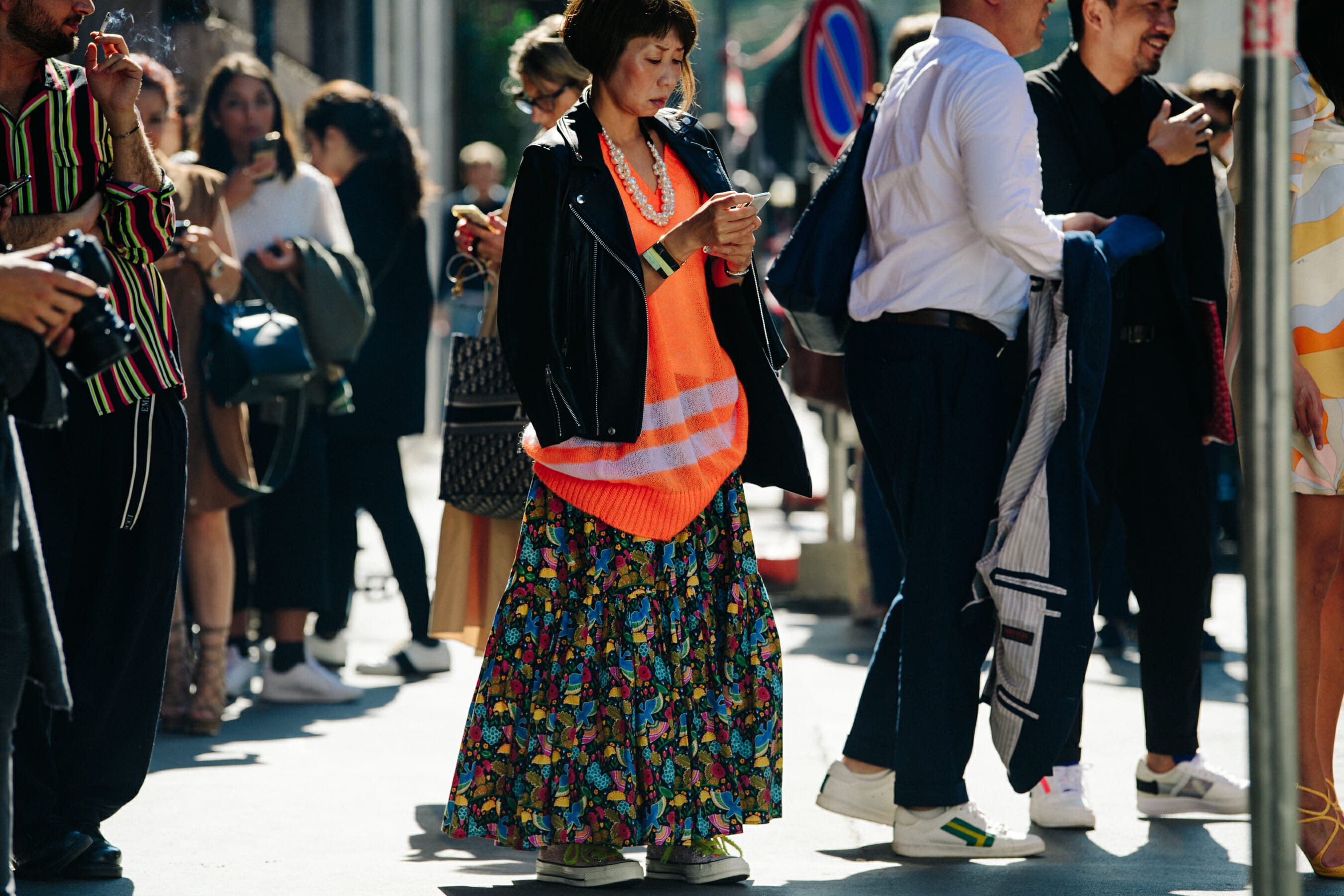 Woman wearing orange wool vest