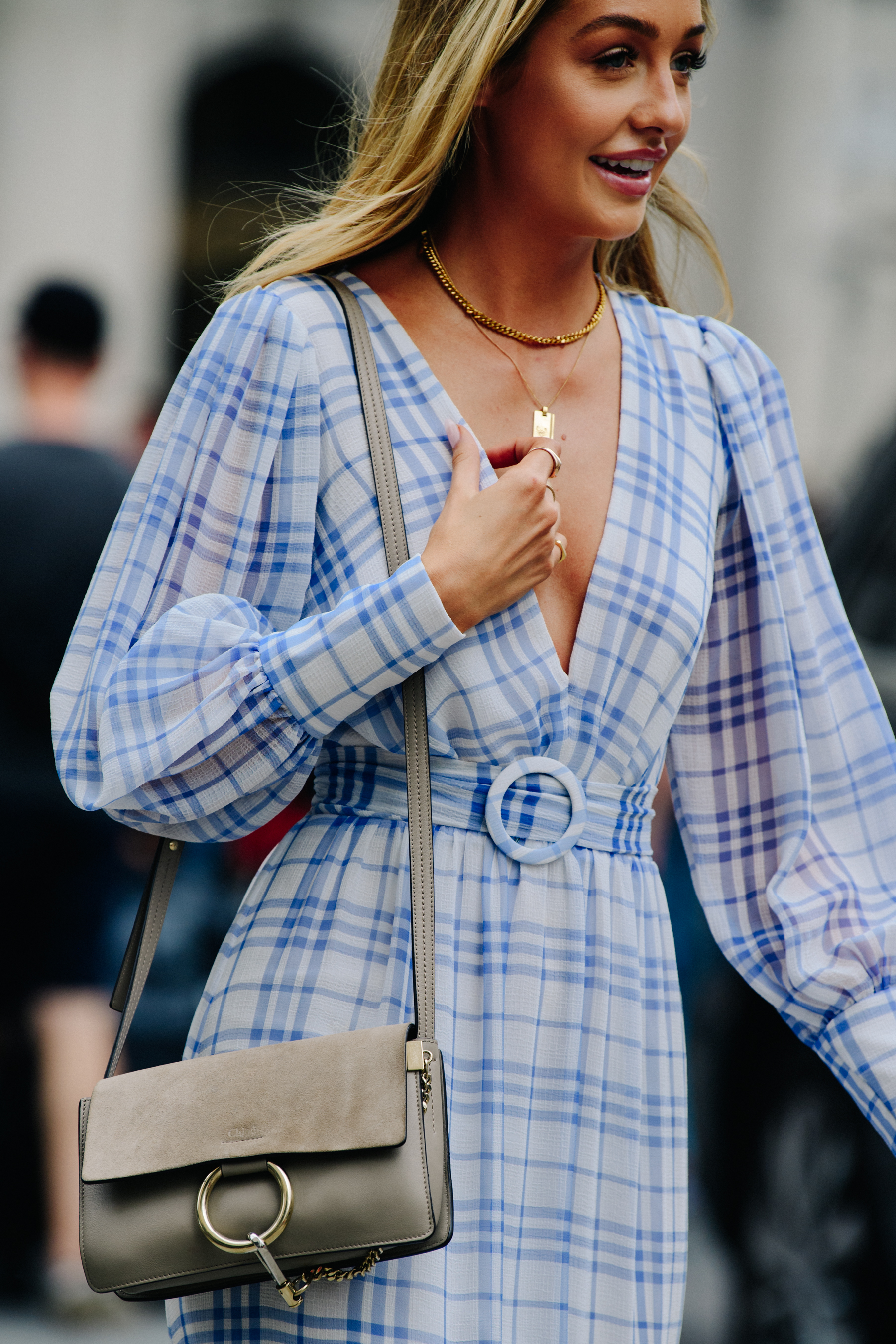 Woman wearing blue check dress