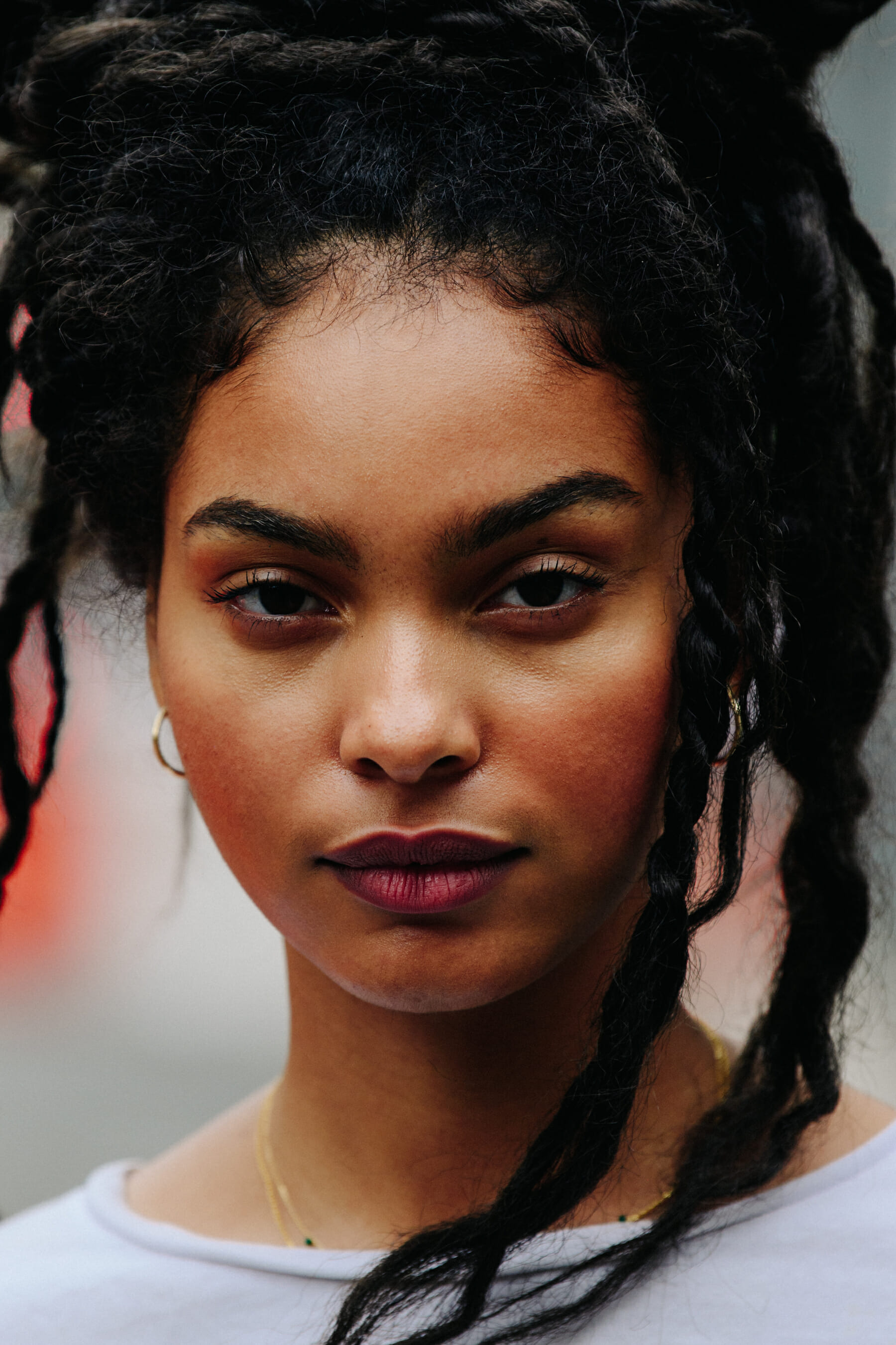 Portrait of woman with dreadlocks