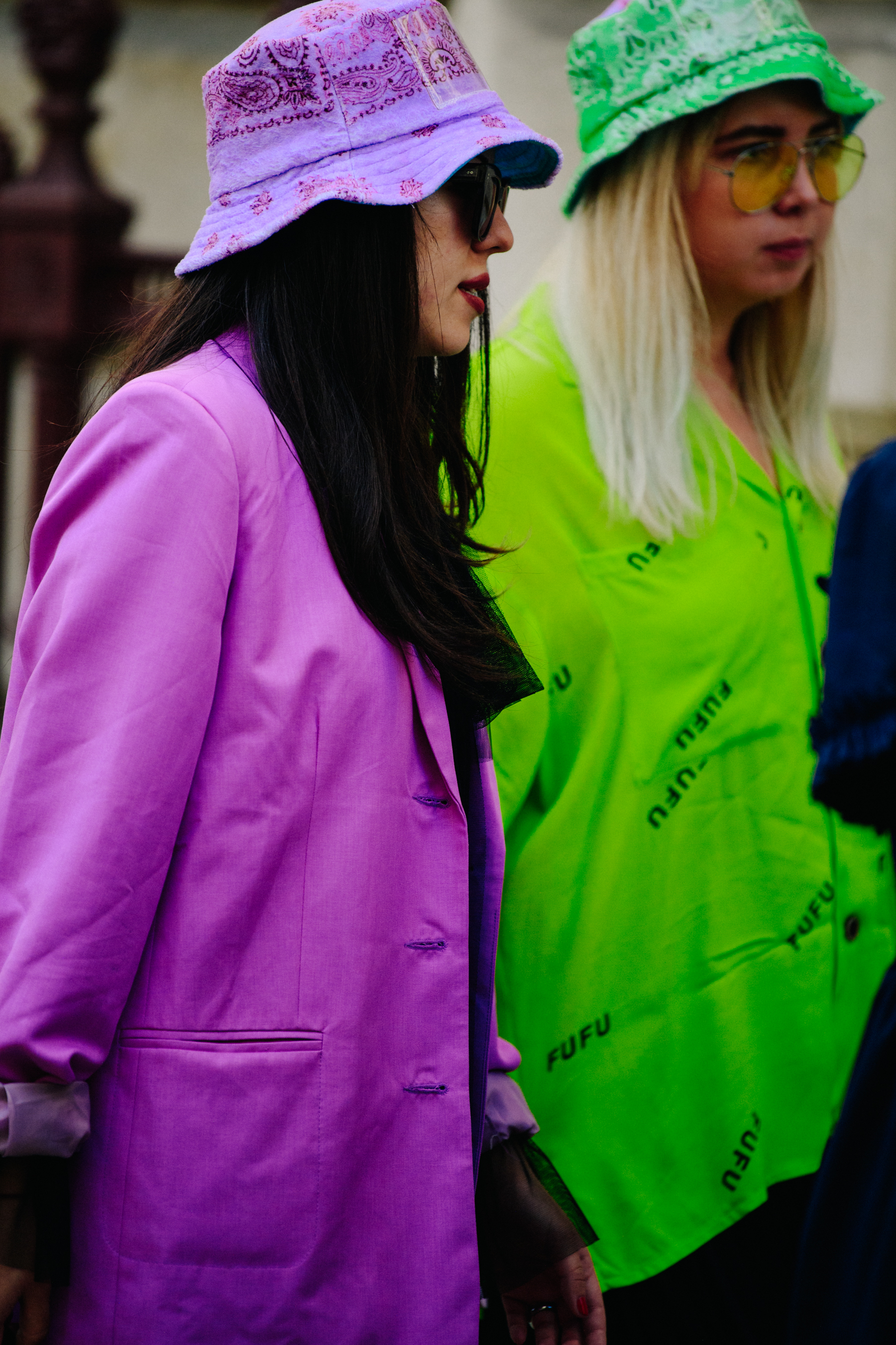 Two women wearing bright colours