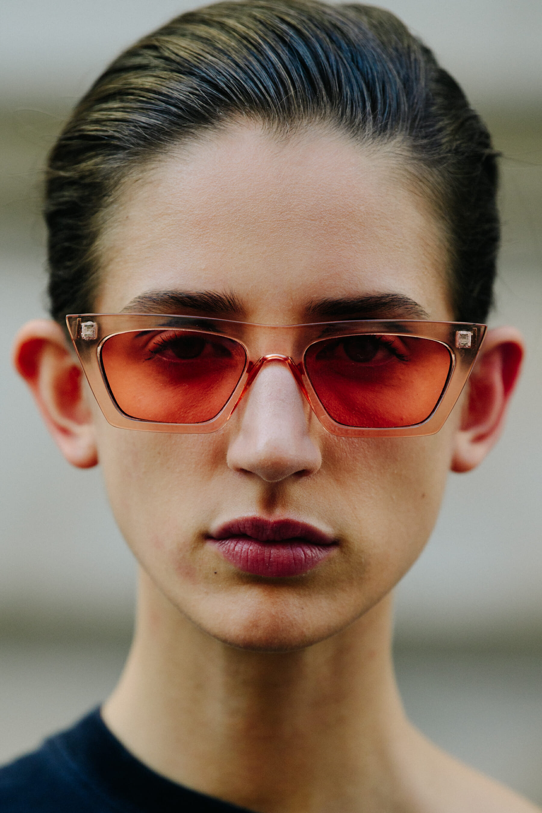 Portrait of model wearing red glasses