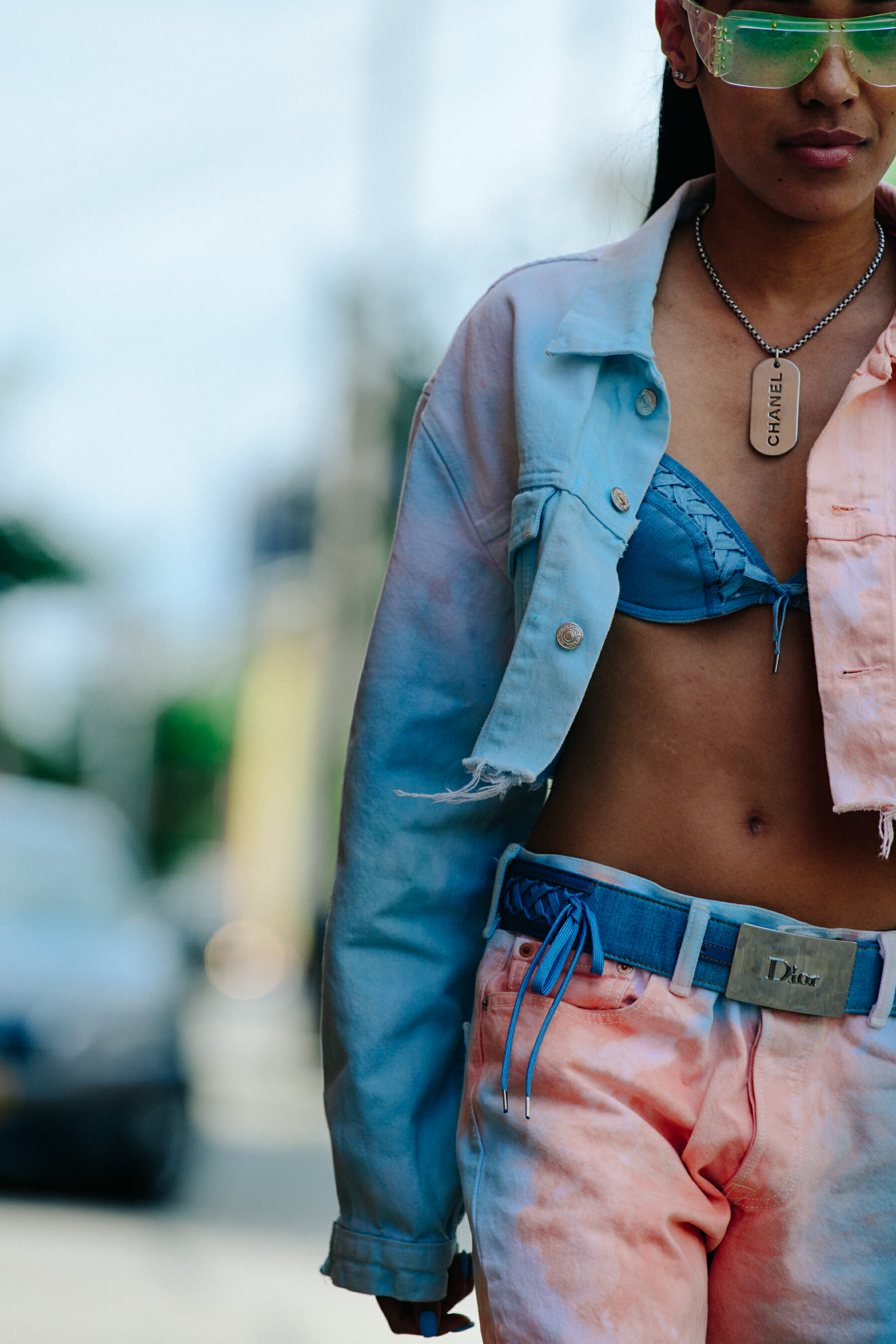 Woman wearing Chanel necklace