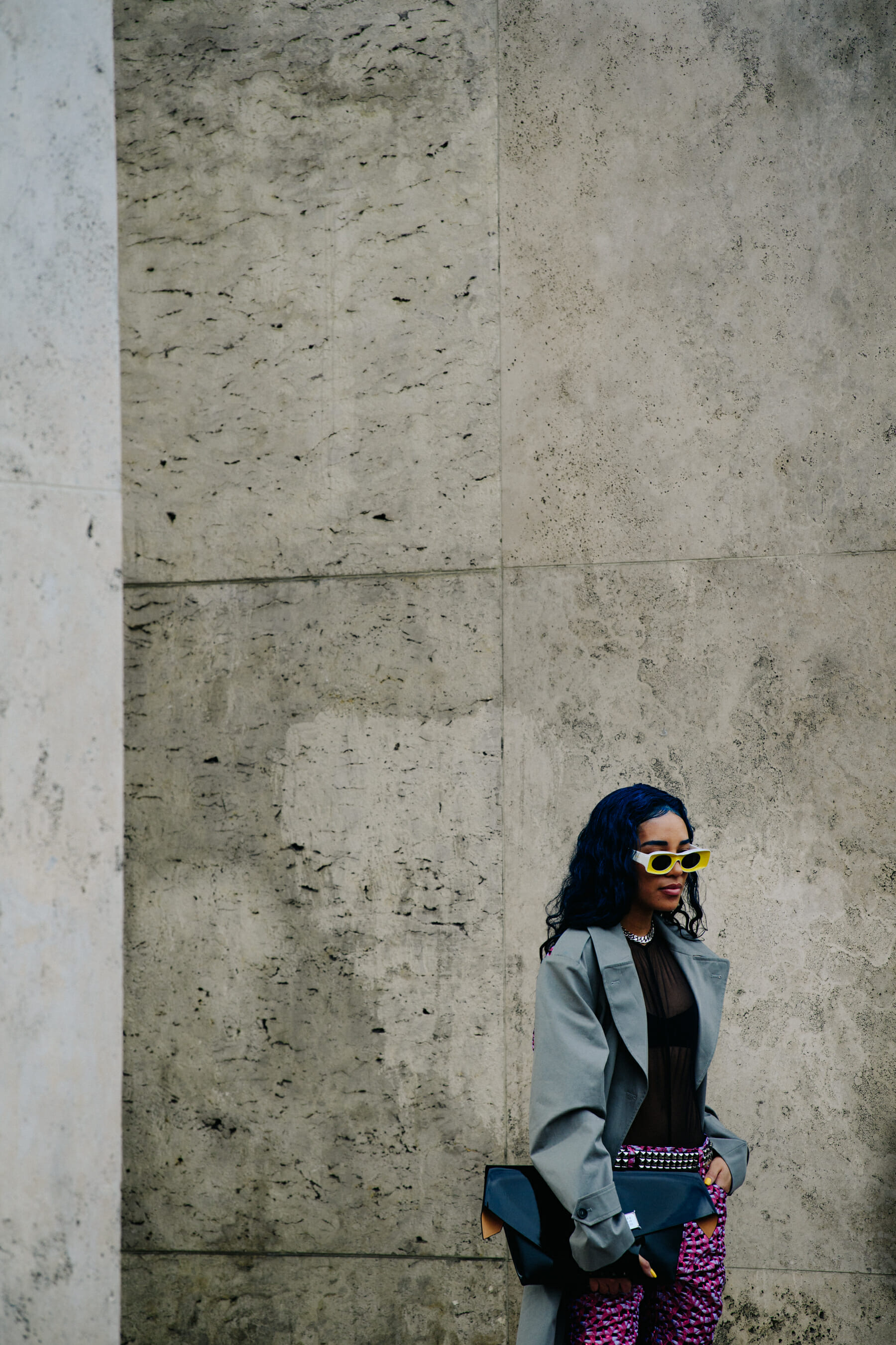 Woman wearing yellow sunglasses