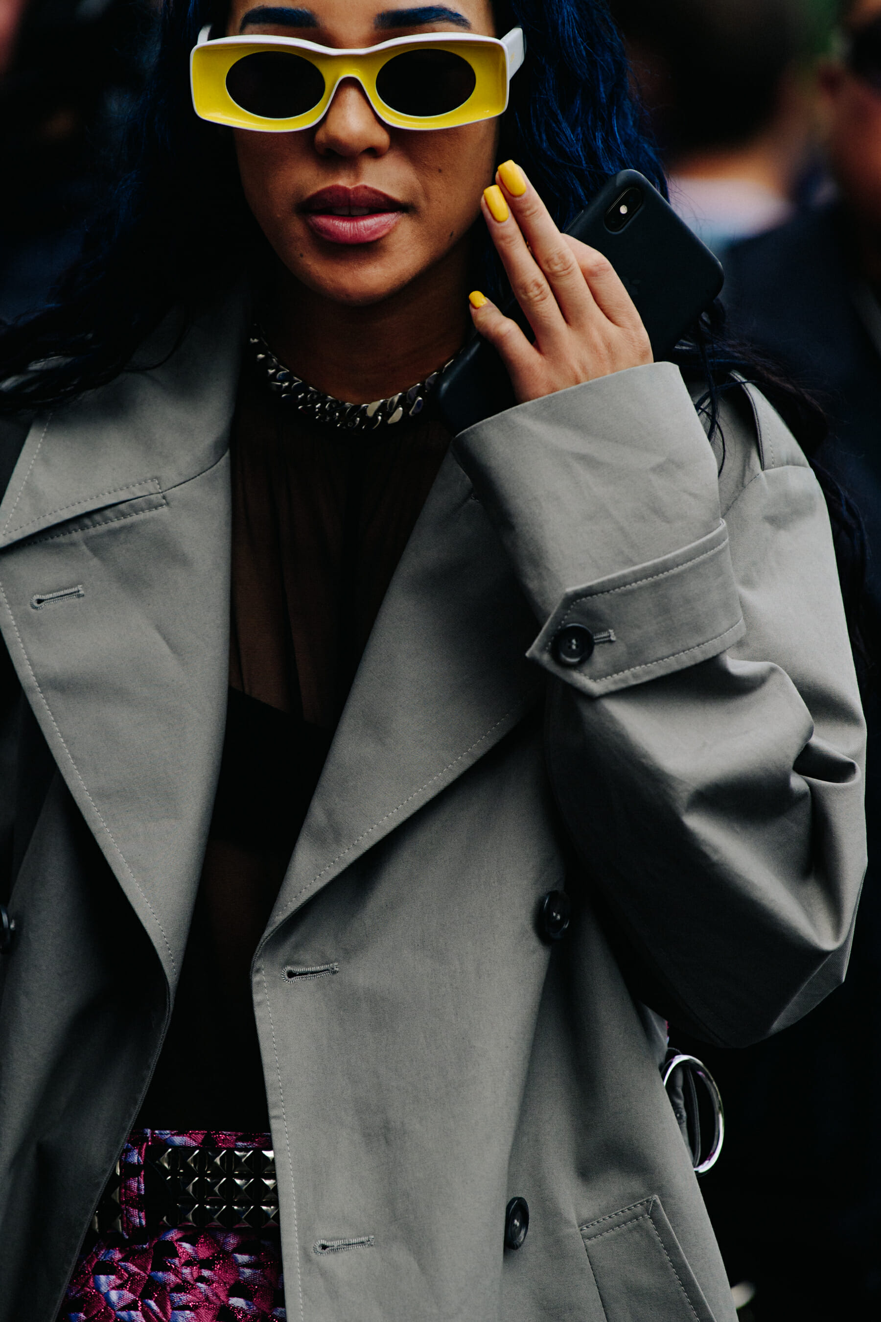 Woman wearing yellow sunglasses