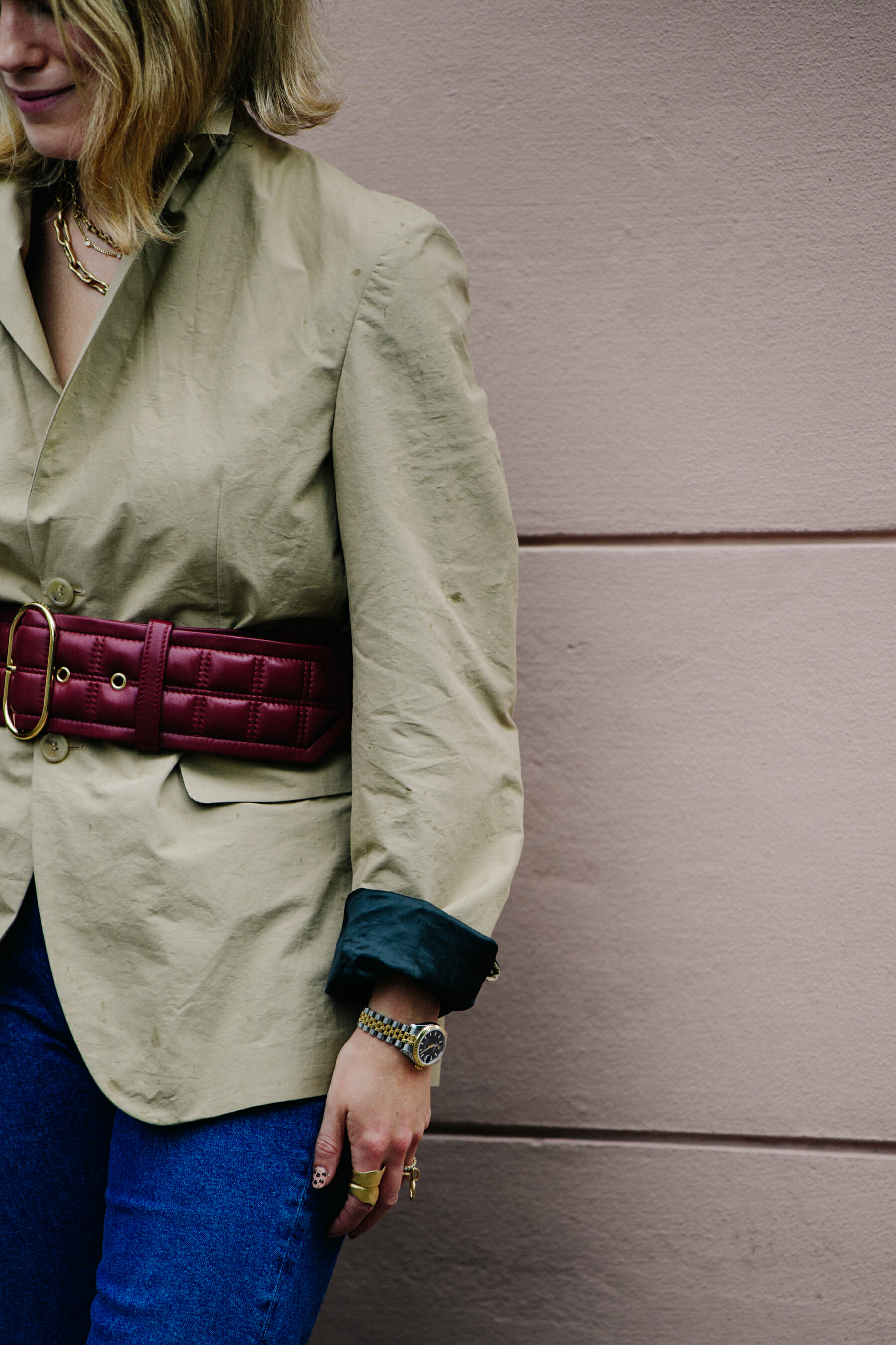 Woman wearing tan jacket