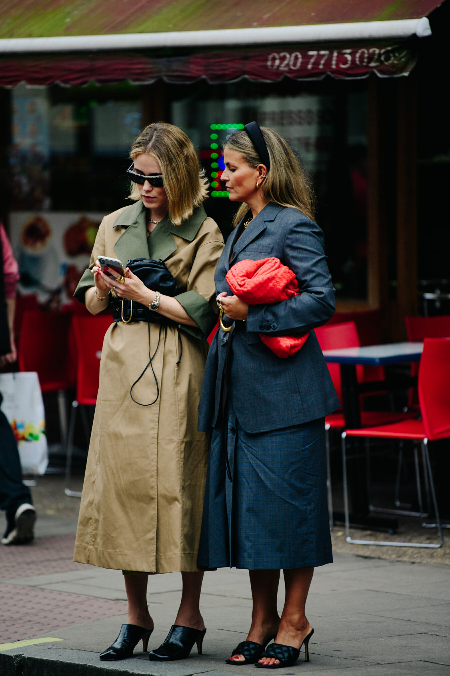Two women wearing long outfits