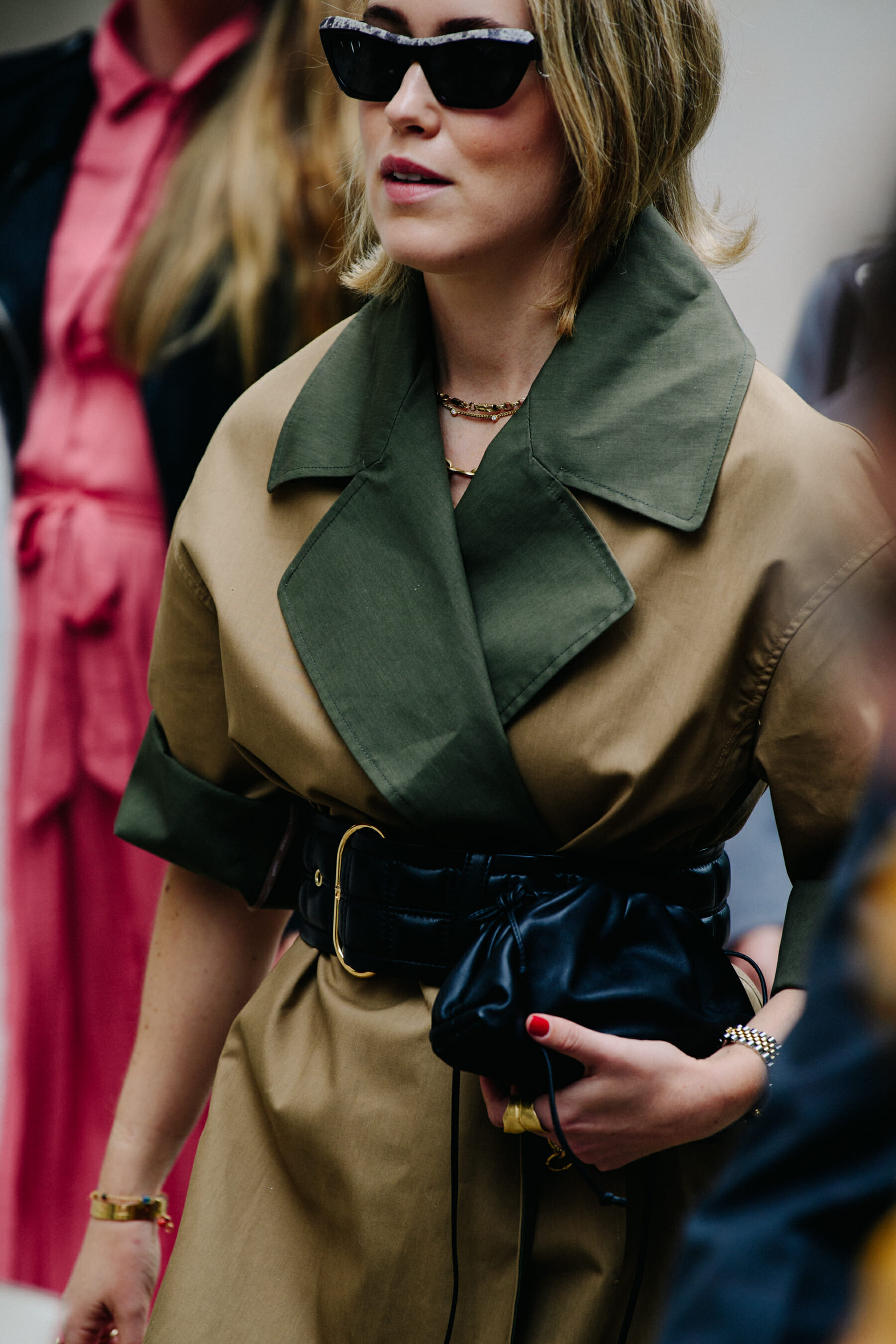 Woman wearing tan coat